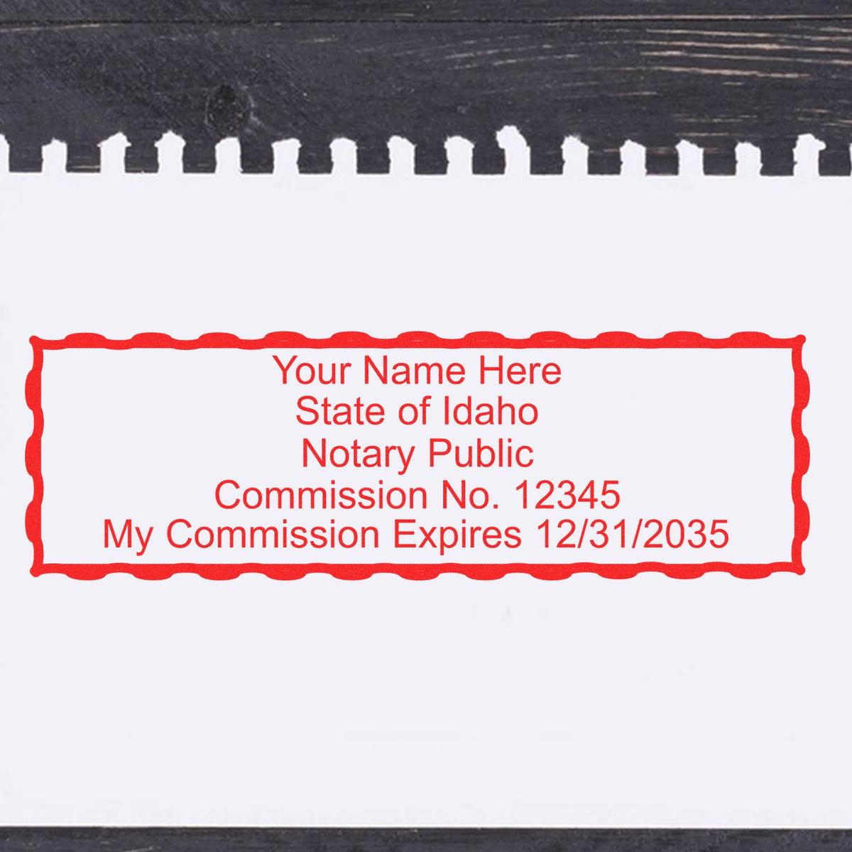 A stamped impression of the Wooden Handle Idaho Rectangular Notary Public Stamp in this stylish lifestyle photo, setting the tone for a unique and personalized product.
