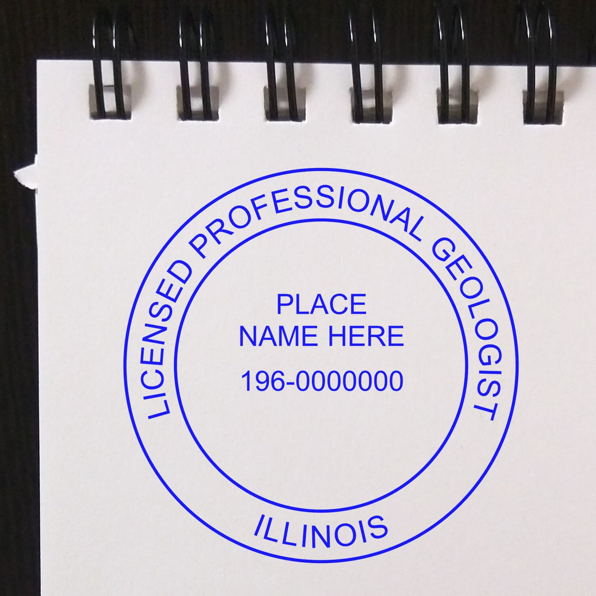 An alternative view of the Slim Pre-Inked Illinois Professional Geologist Seal Stamp stamped on a sheet of paper showing the image in use