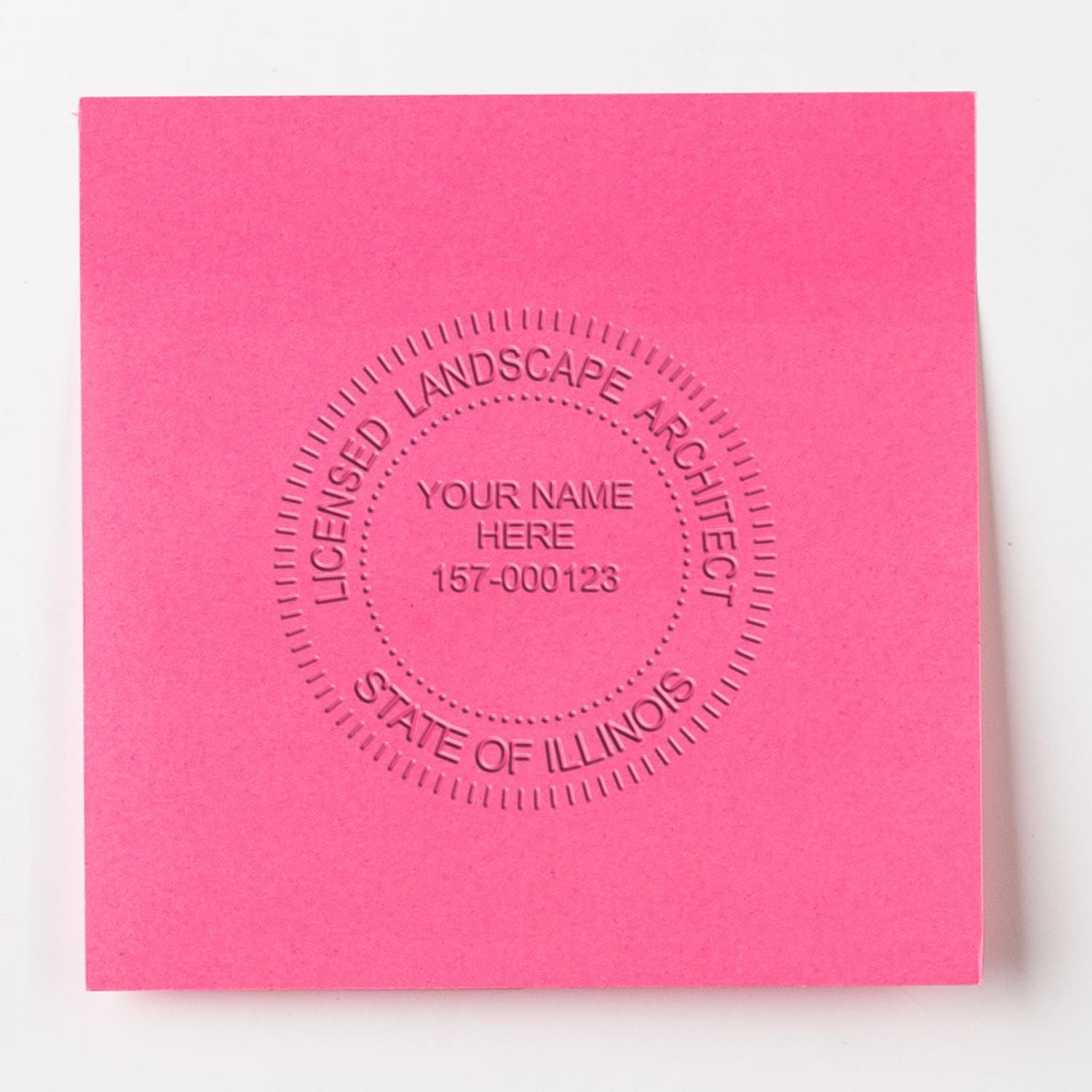 A lifestyle photo showing a stamped image of the State of Illinois Extended Long Reach Landscape Architect Seal Embosser on a piece of paper