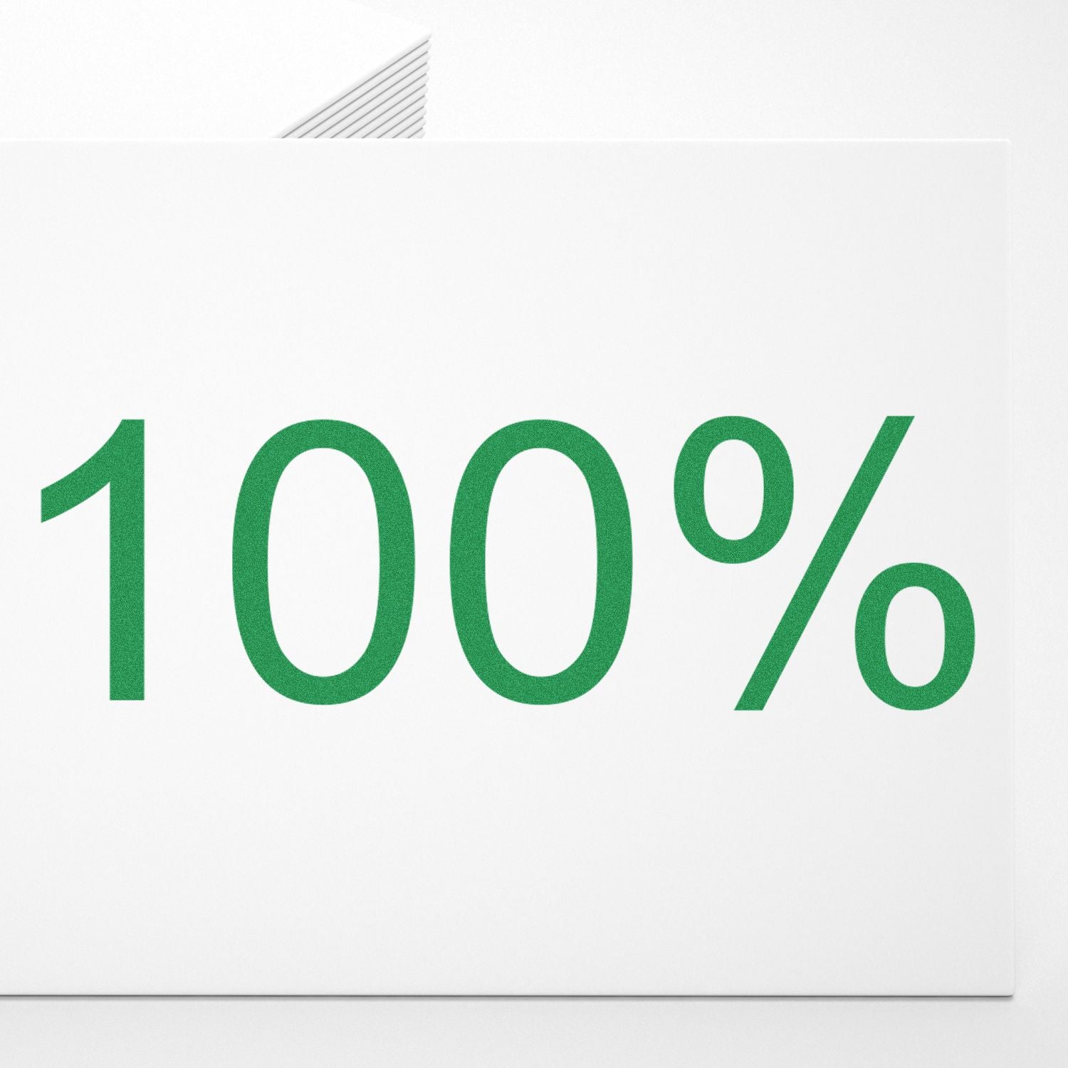 Slim Pre-Inked 100% Stamp in green ink on white paper, showing a clear and bold 100% impression.