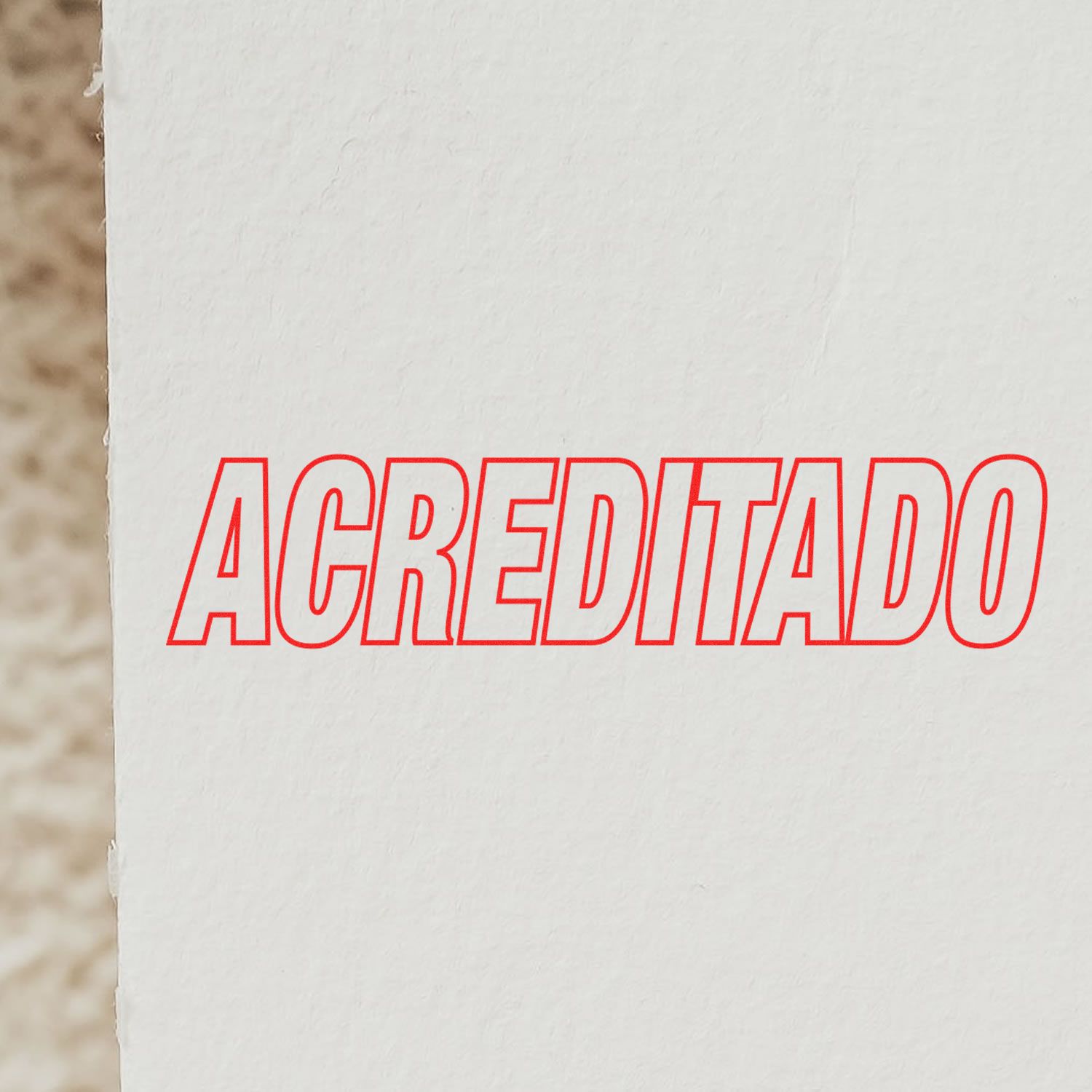 Large Self Inking Acreditado Stamp imprint in red on white paper, showcasing the clear and bold text produced by the stamp.