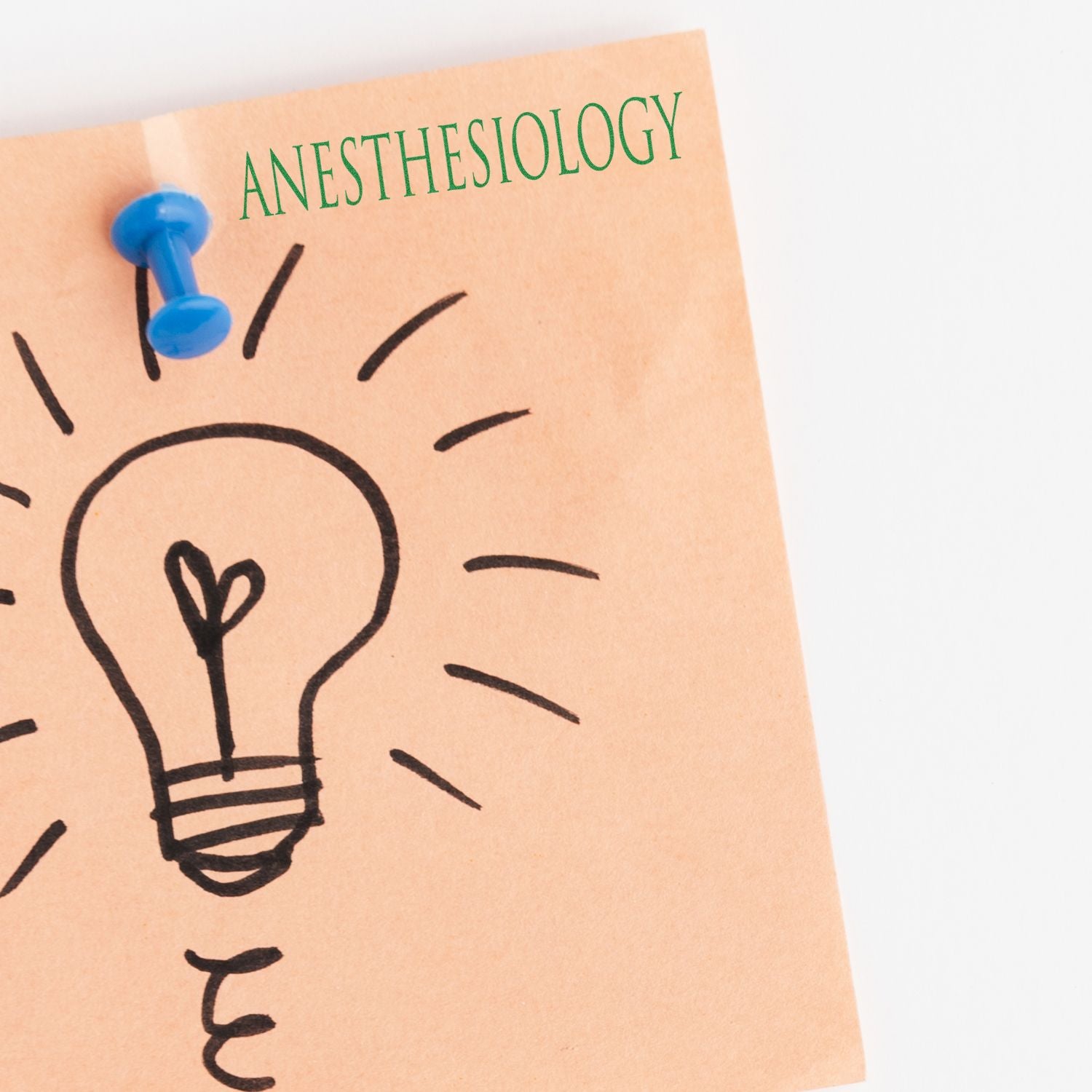 Orange sticky note with a lightbulb drawing, blue pushpin, and Anesthesiology stamped in green at the top.