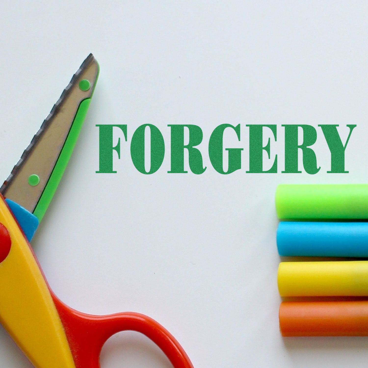 Large Self Inking Forgery Stamp in use, with colorful markers and scissors on a white background. The word FORGERY is stamped in green.