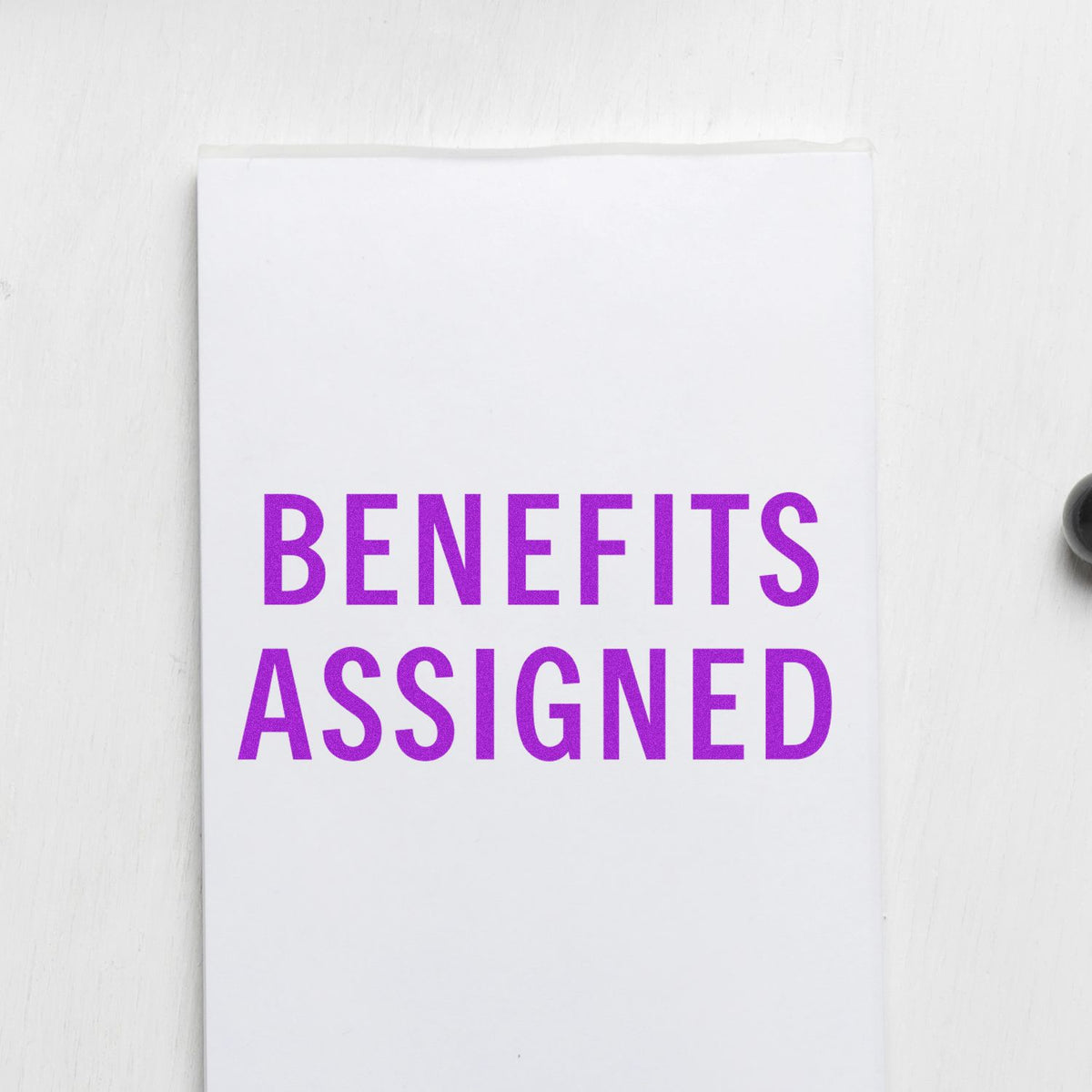 Benefits Assigned Rubber Stamp In Use