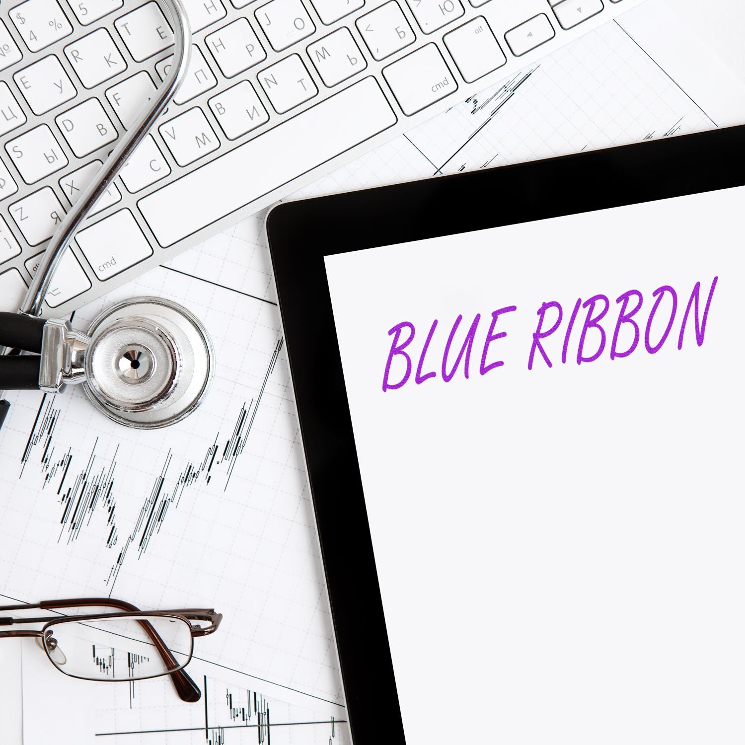 Blue Ribbon Rubber Stamp on a tablet screen, surrounded by a keyboard, stethoscope, glasses, and financial charts.