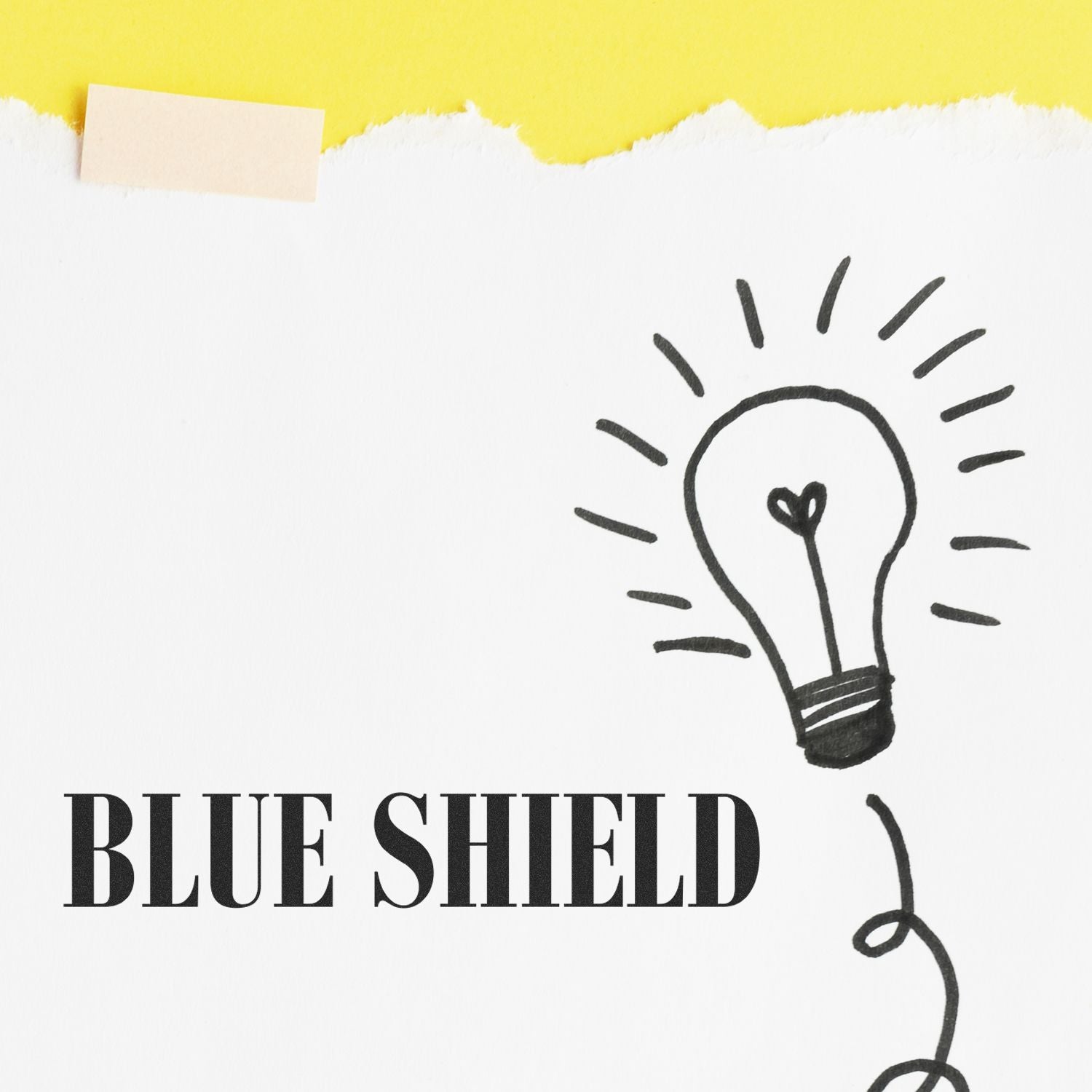 Slim Pre-Inked Blue Shield Stamp in use on white paper with a lightbulb drawing and yellow background.