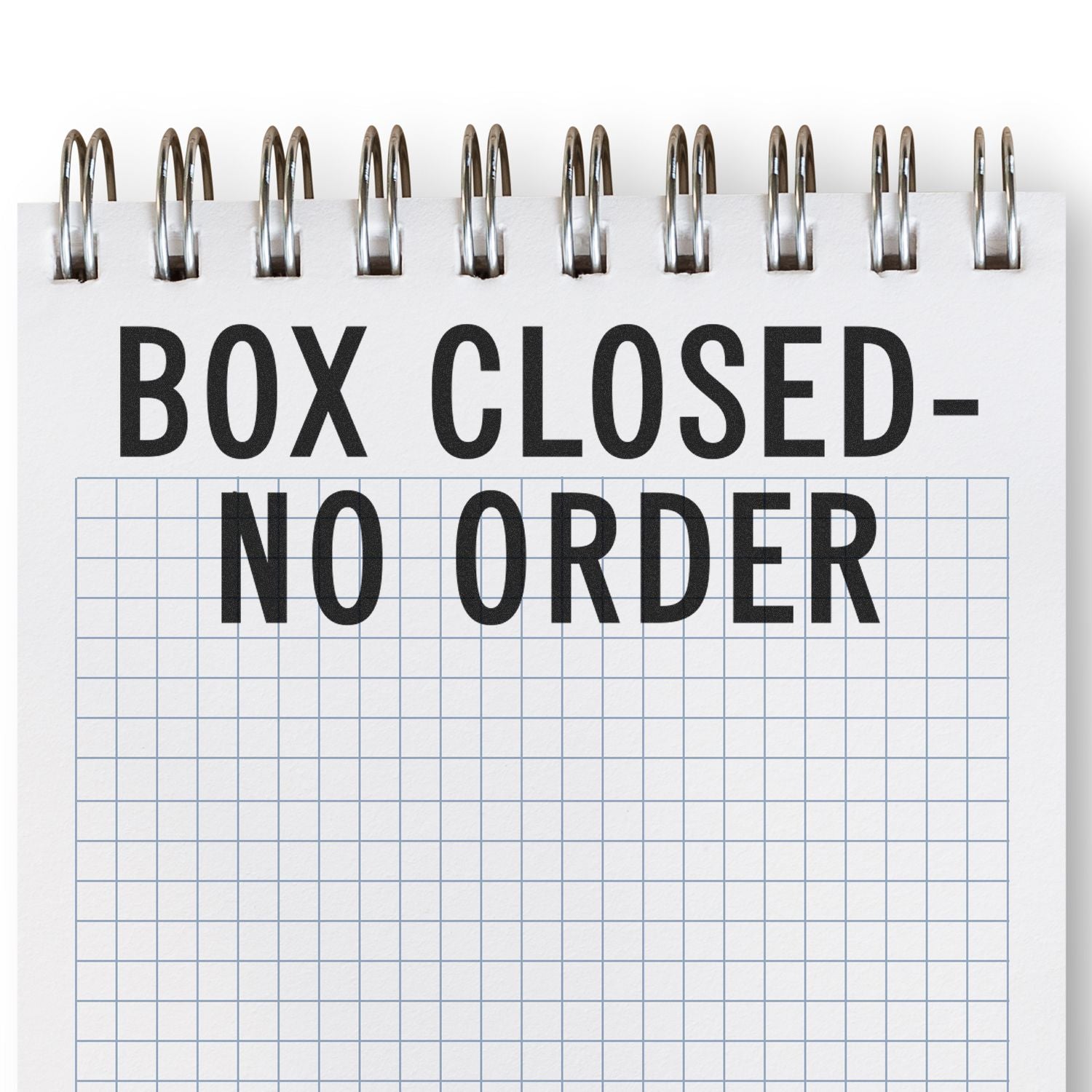 Large Self Inking Box Closed No Order Stamp on a grid notebook, indicating no orders with bold black text.