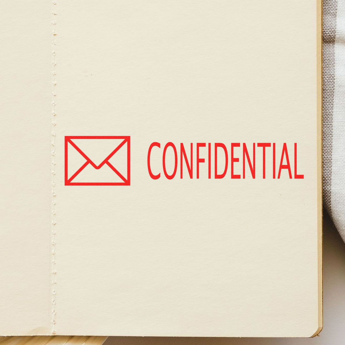 Confidential with Envelope Rubber Stamp In Use Photo