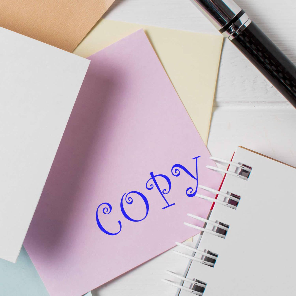 Large Pre-Inked Curly Copy Stamp In Use Photo