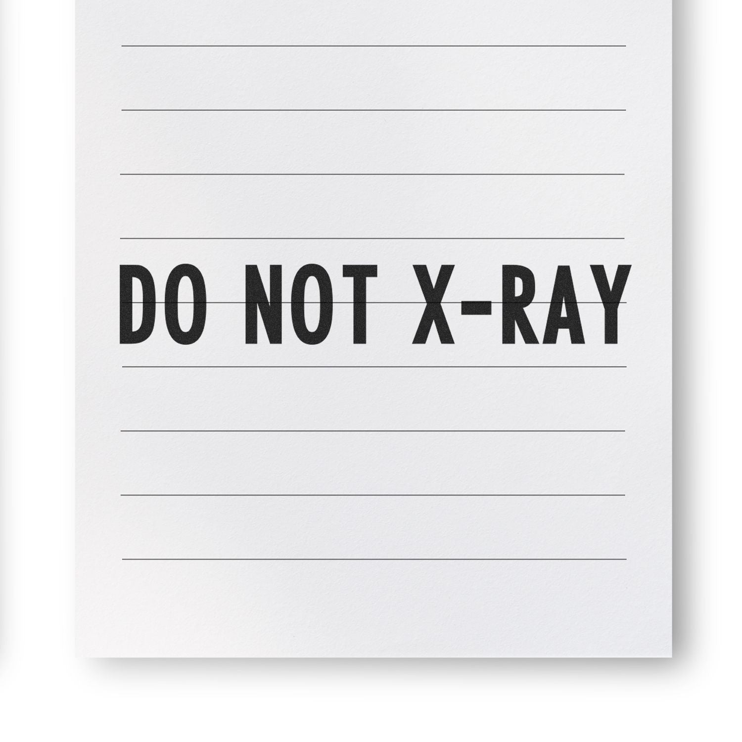 Do Not X-Ray Rubber Stamp imprint on lined paper, showing clear and bold text in black ink.