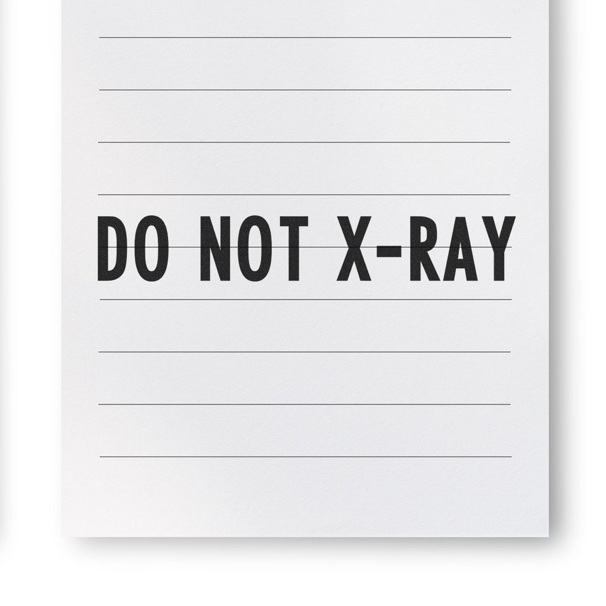 Slim Pre-Inked Do Not X-Ray Stamp Lifestyle Photo