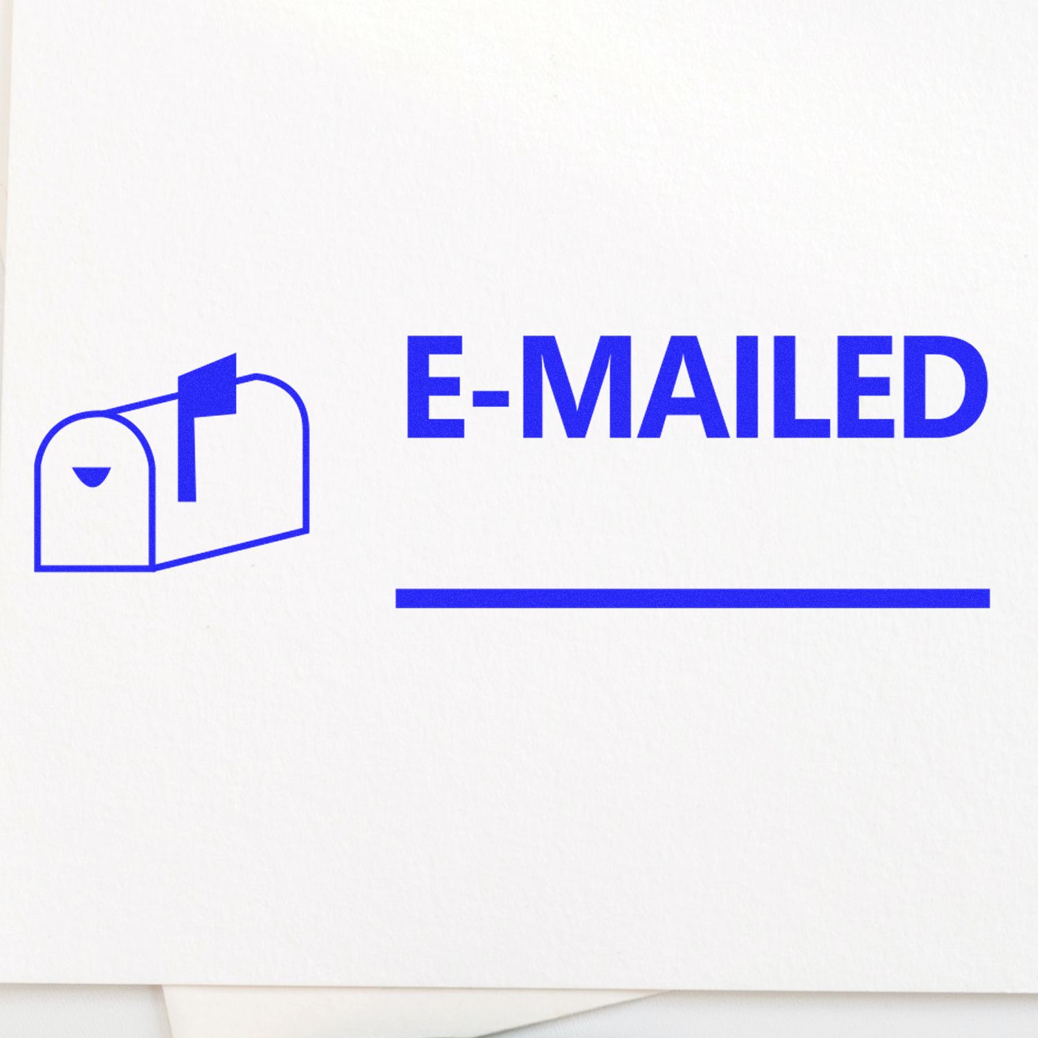 Emailed with Mailbox Rubber Stamp in blue ink on white paper, featuring a mailbox icon and the word 'E-MAILED' with a blank line underneath.