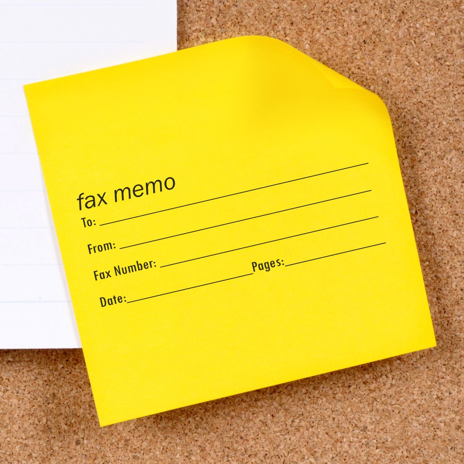 Yellow fax memo with To, From, Fax Number, Date, and Pages fields on corkboard, stamped with Slim Pre-Inked Fax It 2 Stamp.