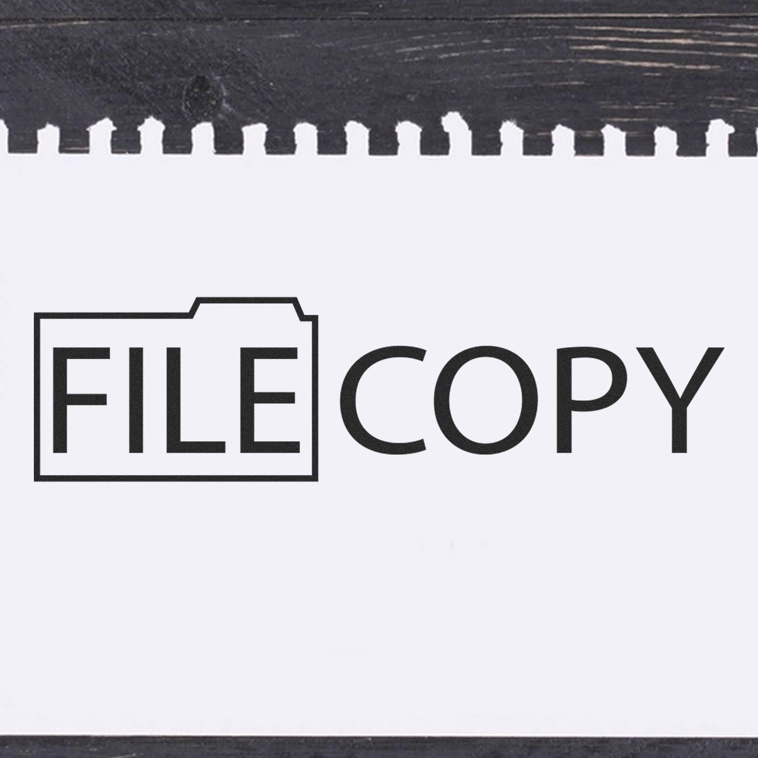 Self Inking File Copy with Folder Stamp imprint on a white paper, showing the text FILE COPY with a folder icon on the left.