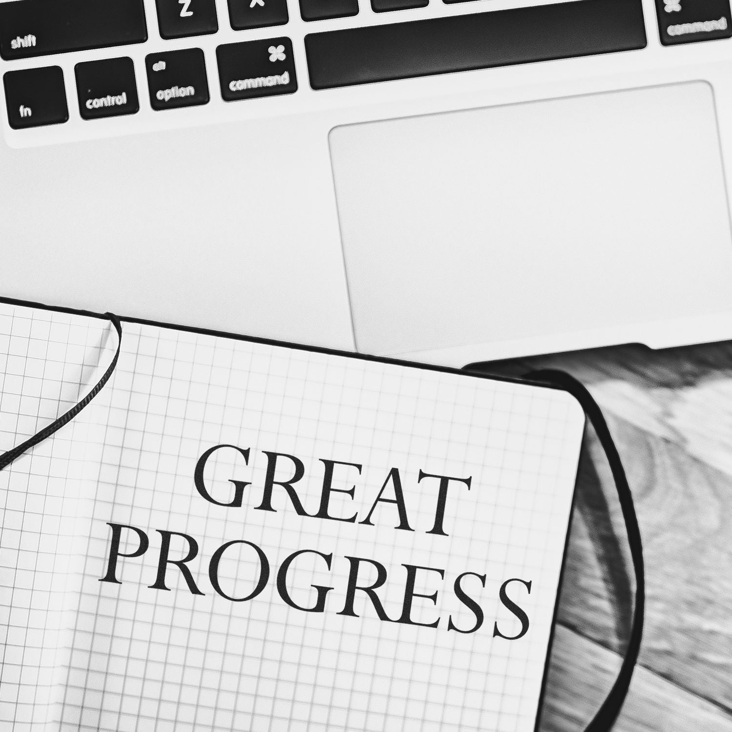 Great Progress Rubber Stamp used on a notebook page, placed next to a laptop keyboard.