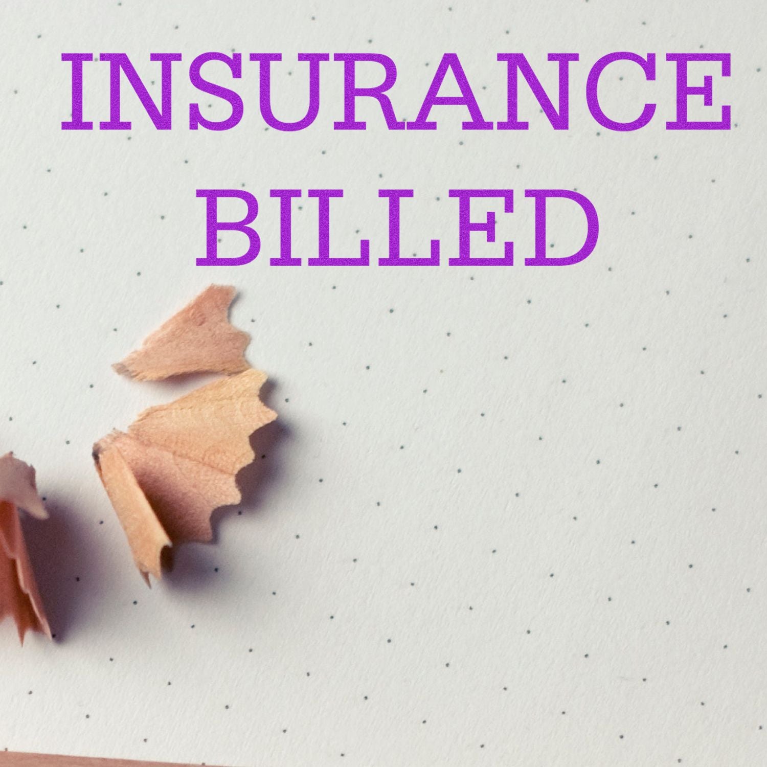 Insurance Billed Rubber Stamp in use on dotted paper with pencil shavings nearby, displaying the stamped text 'INSURANCE BILLED' in purple.