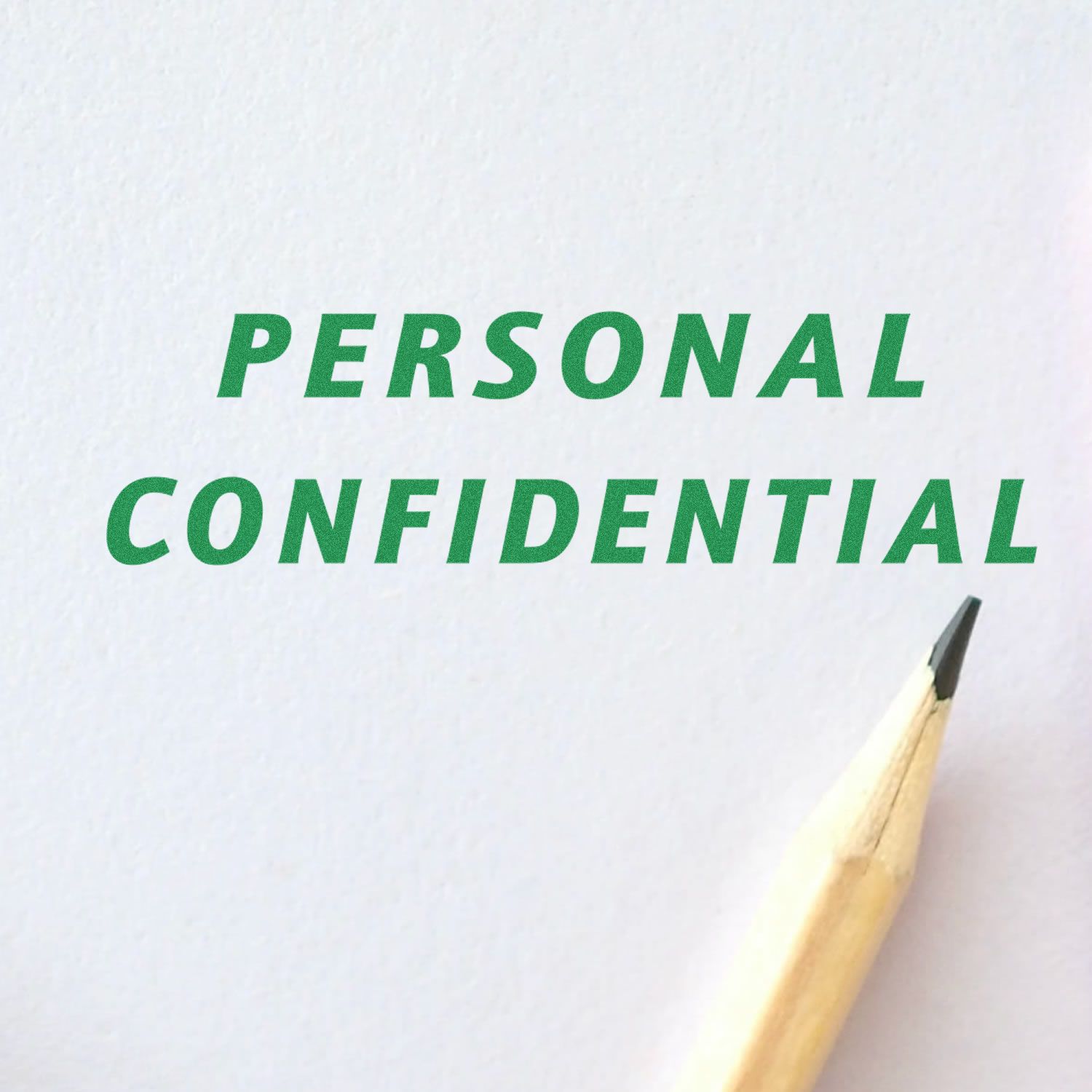 A green PERSONAL CONFIDENTIAL mark from the _Italic Personal Confidential Rubber Stamp_ on white paper, with a pencil tip nearby.