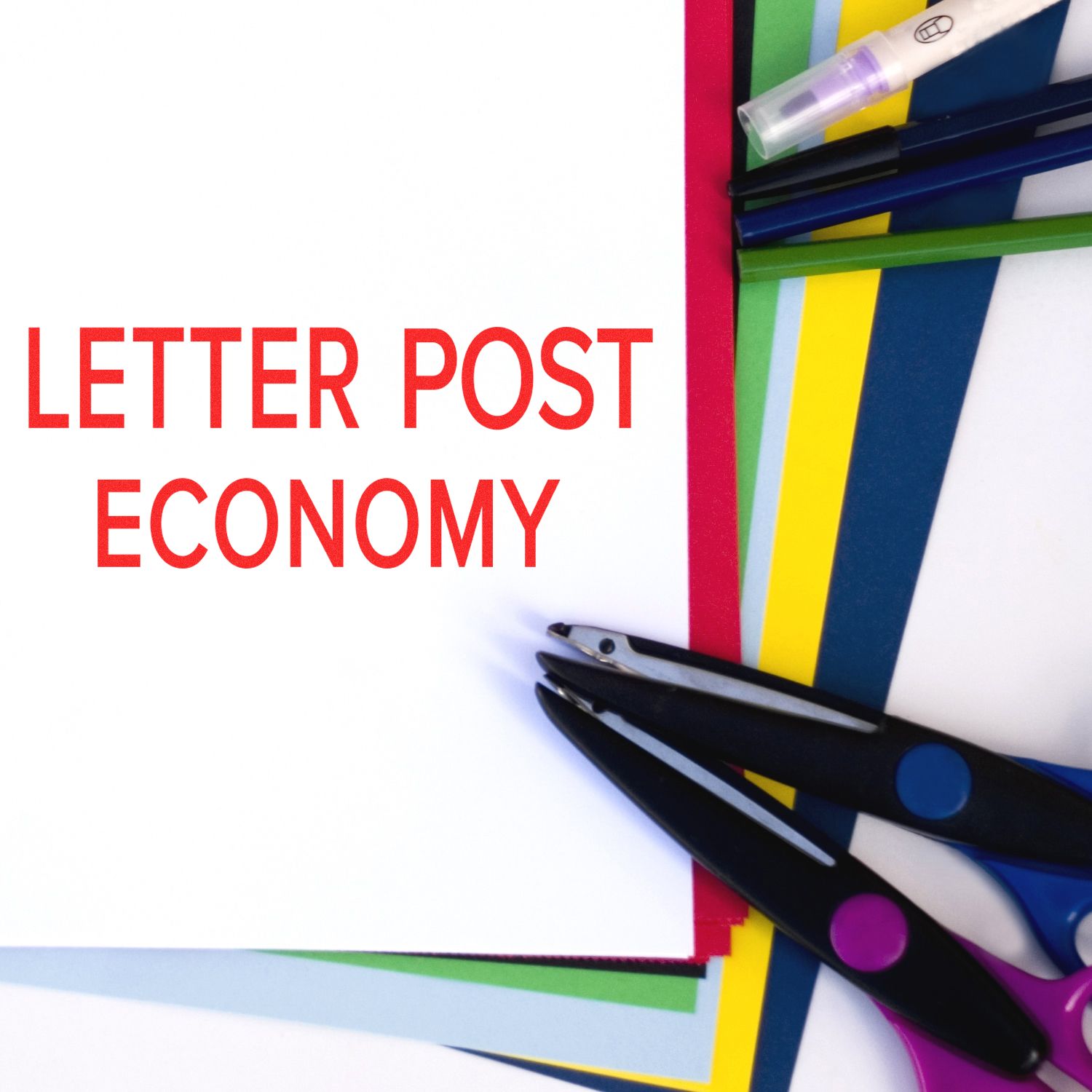 Letter Post Economy Rubber Stamp in use on colorful paper, surrounded by scissors, pens, and markers.