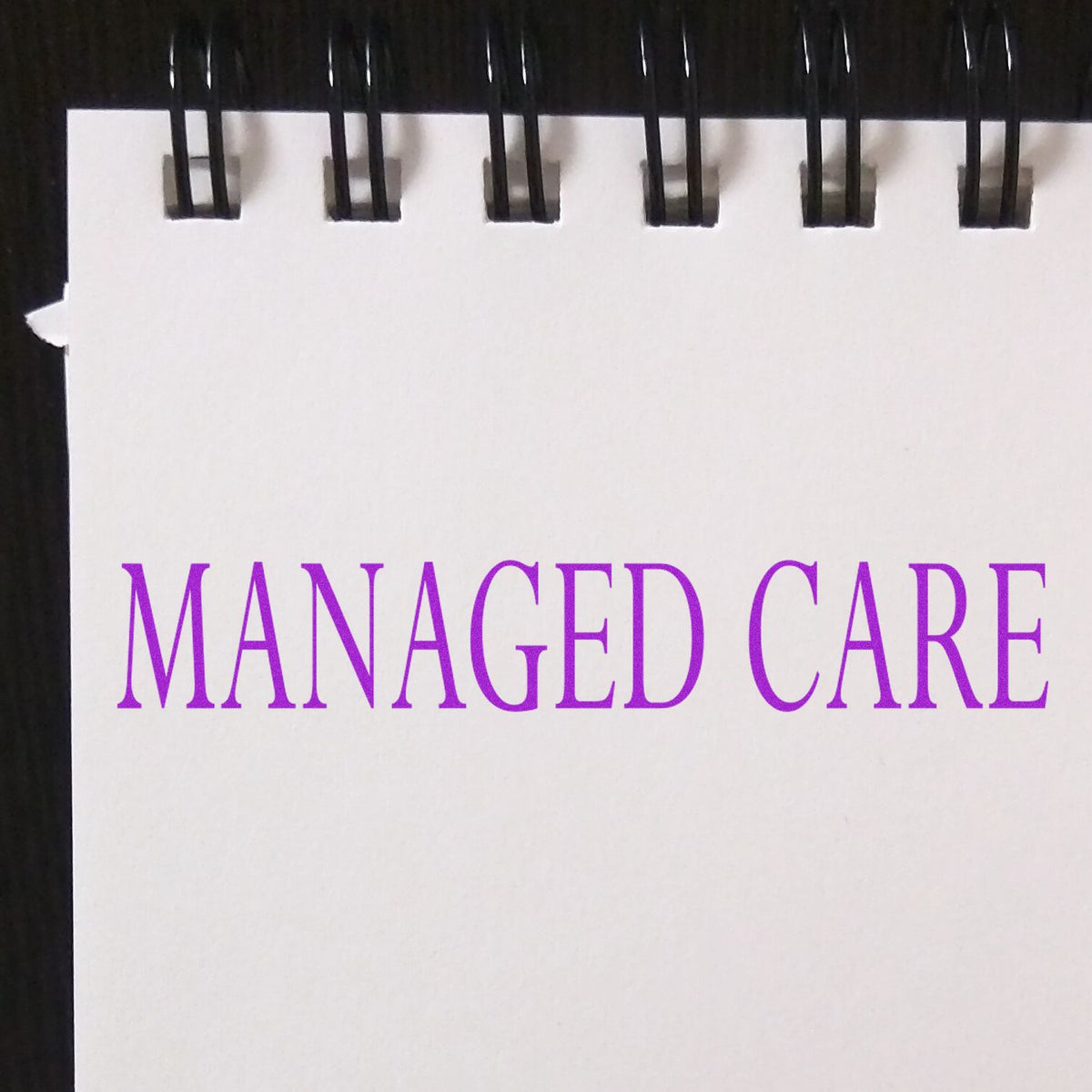 Large Managed Care Rubber Stamp In Use