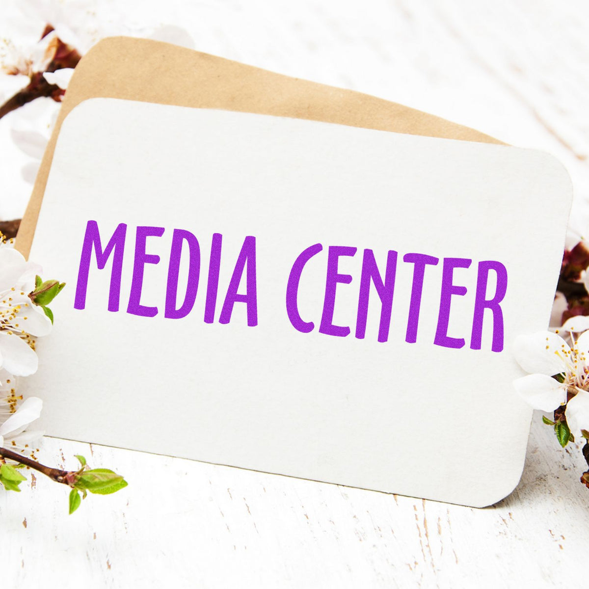 Large Media Center Rubber Stamp In Use