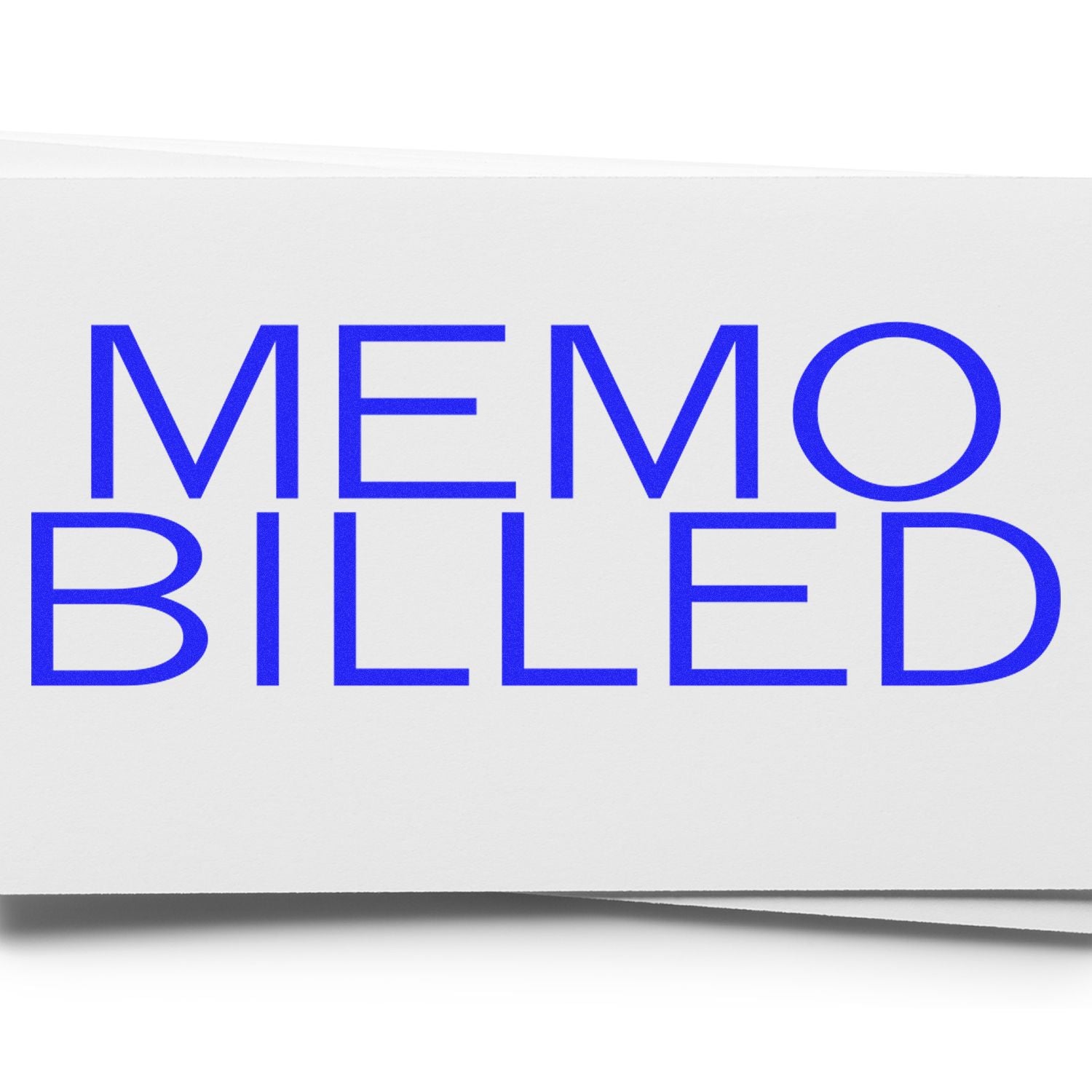 Memo Billed Rubber Stamp in blue ink on white paper, showing the text "MEMO BILLED" in bold, uppercase letters.