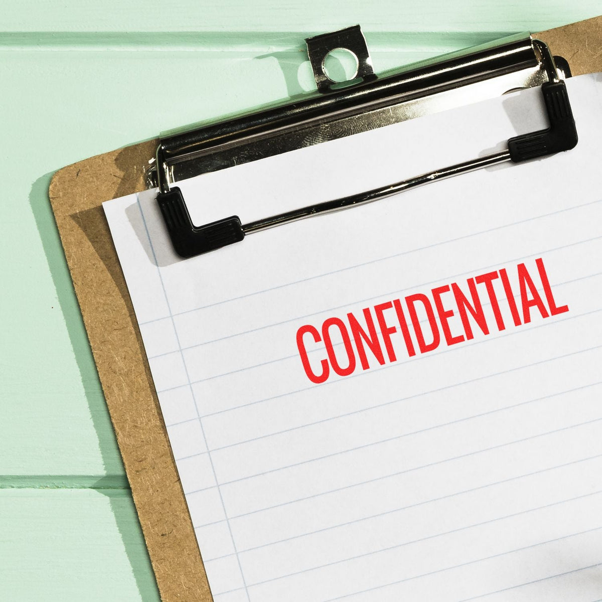 Self-Inking Narrow Confidential Stamp In Use Photo