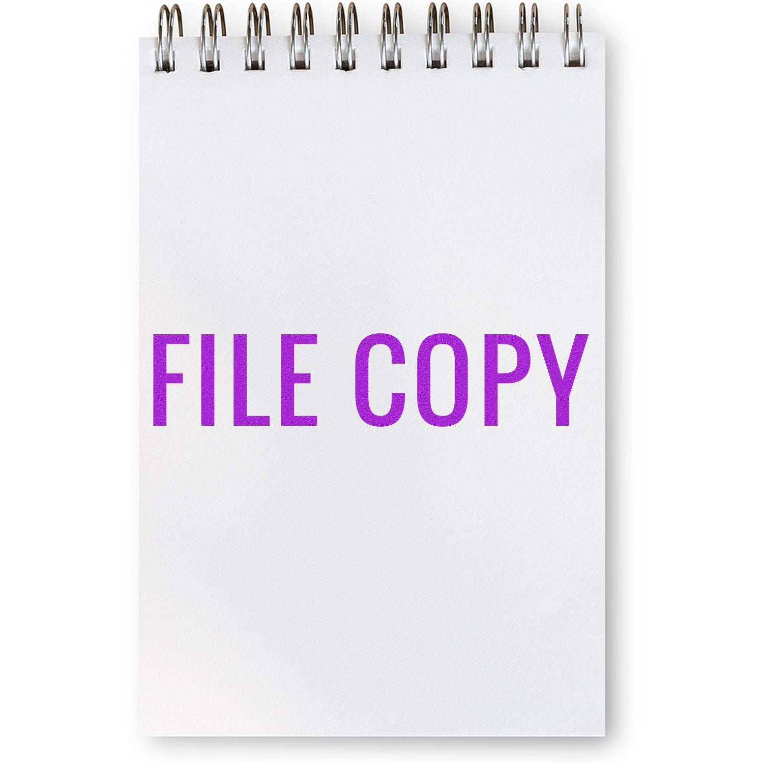 Notepad stamped with FILE COPY in purple using the Large Narrow Font File Copy Rubber Stamp.