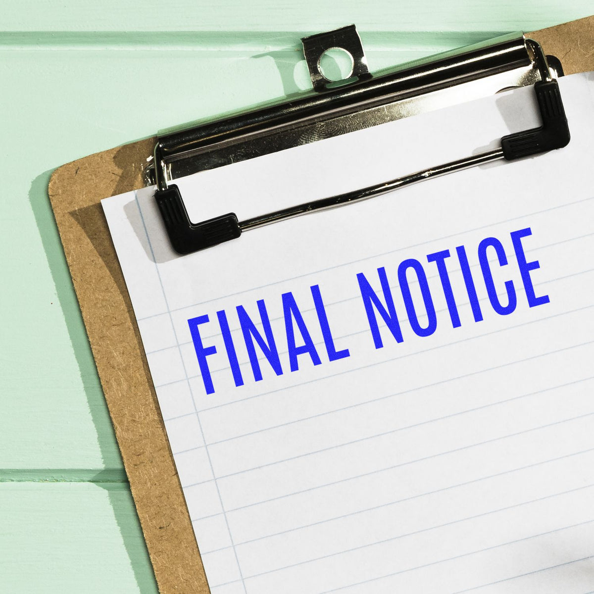 Large Self-Inking Narrow Font Final Notice Stamp In Use Photo