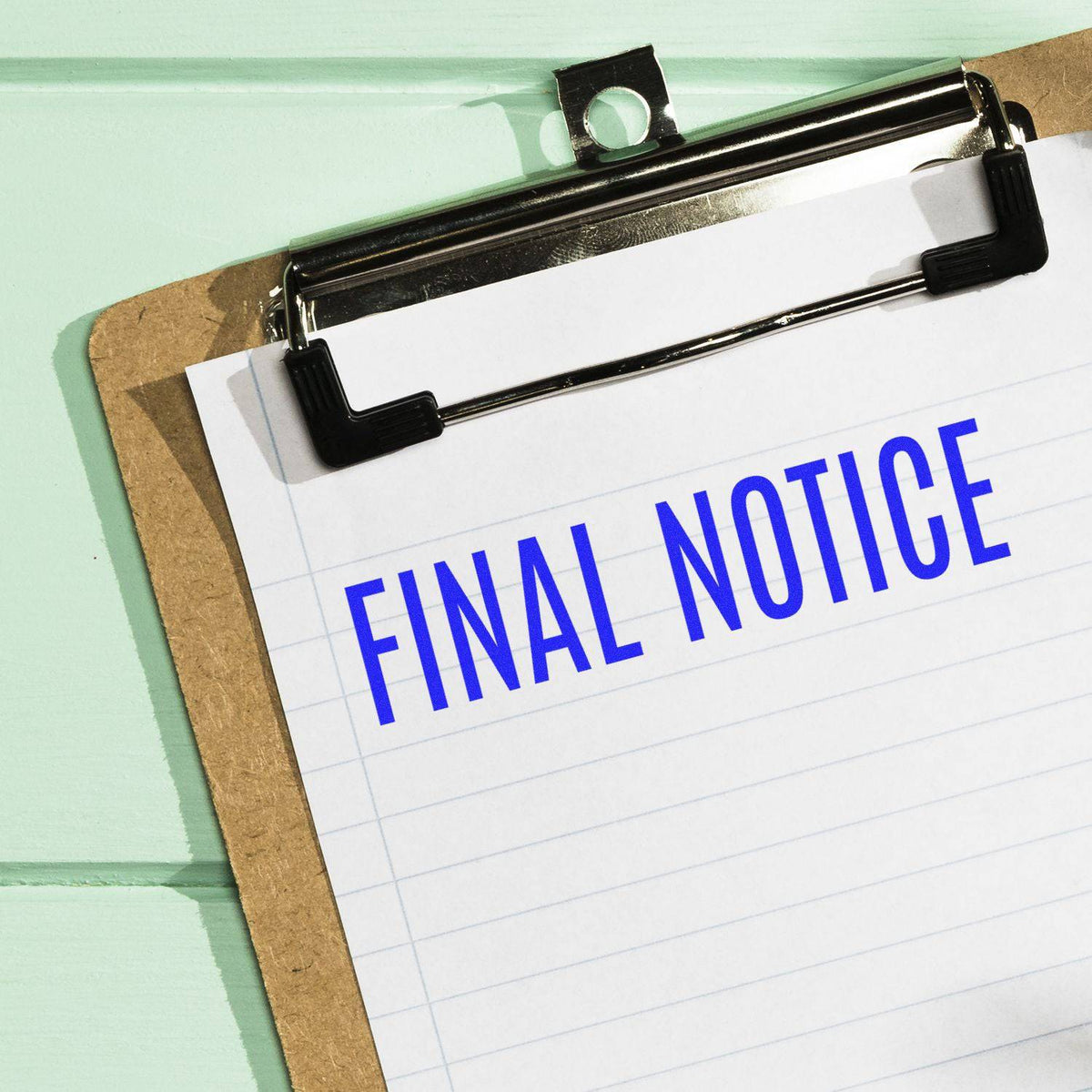 Large Pre-Inked Narrow Font Final Notice Stamp In Use Photo