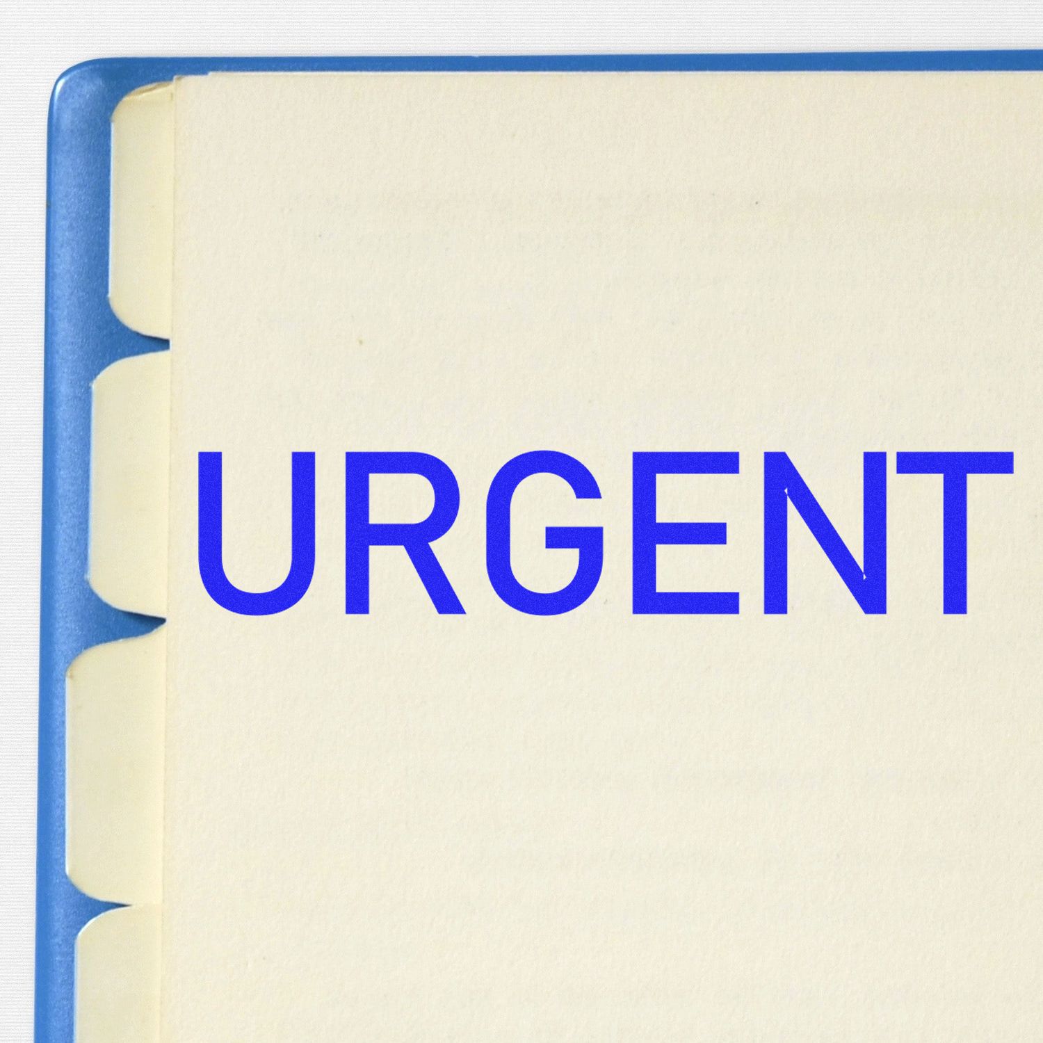 Narrow Font Urgent Rubber Stamp in blue ink on a document with tabbed dividers in a blue binder.