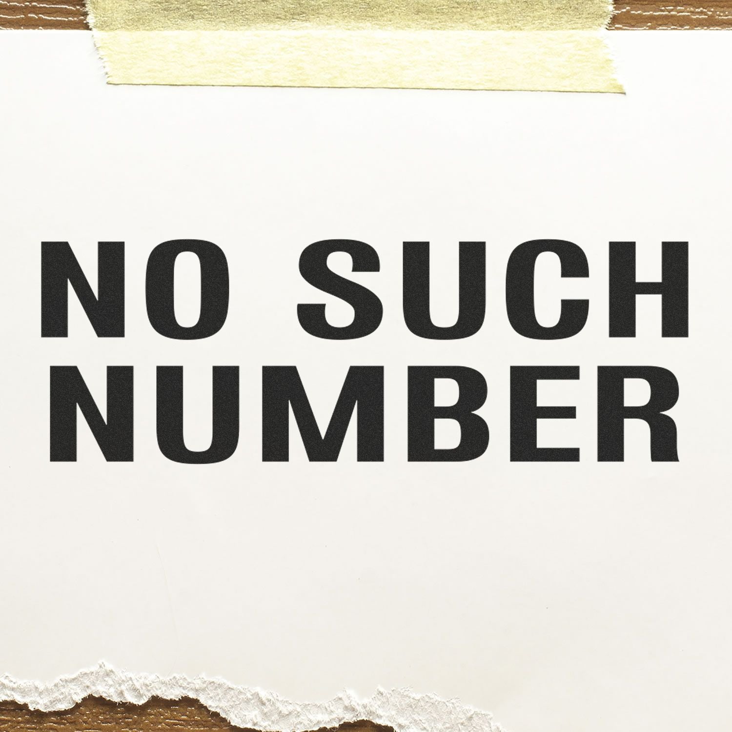 Large No Such Number Rubber Stamp in use, stamping NO SUCH NUMBER in bold black letters on white paper, taped at the top.