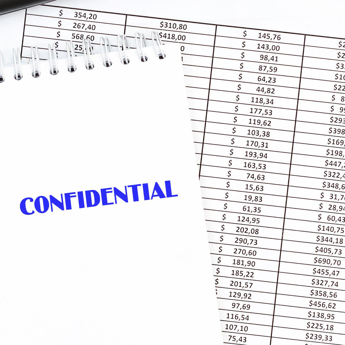 Large Self-Inking Optima Confidential Stamp In Use Photo