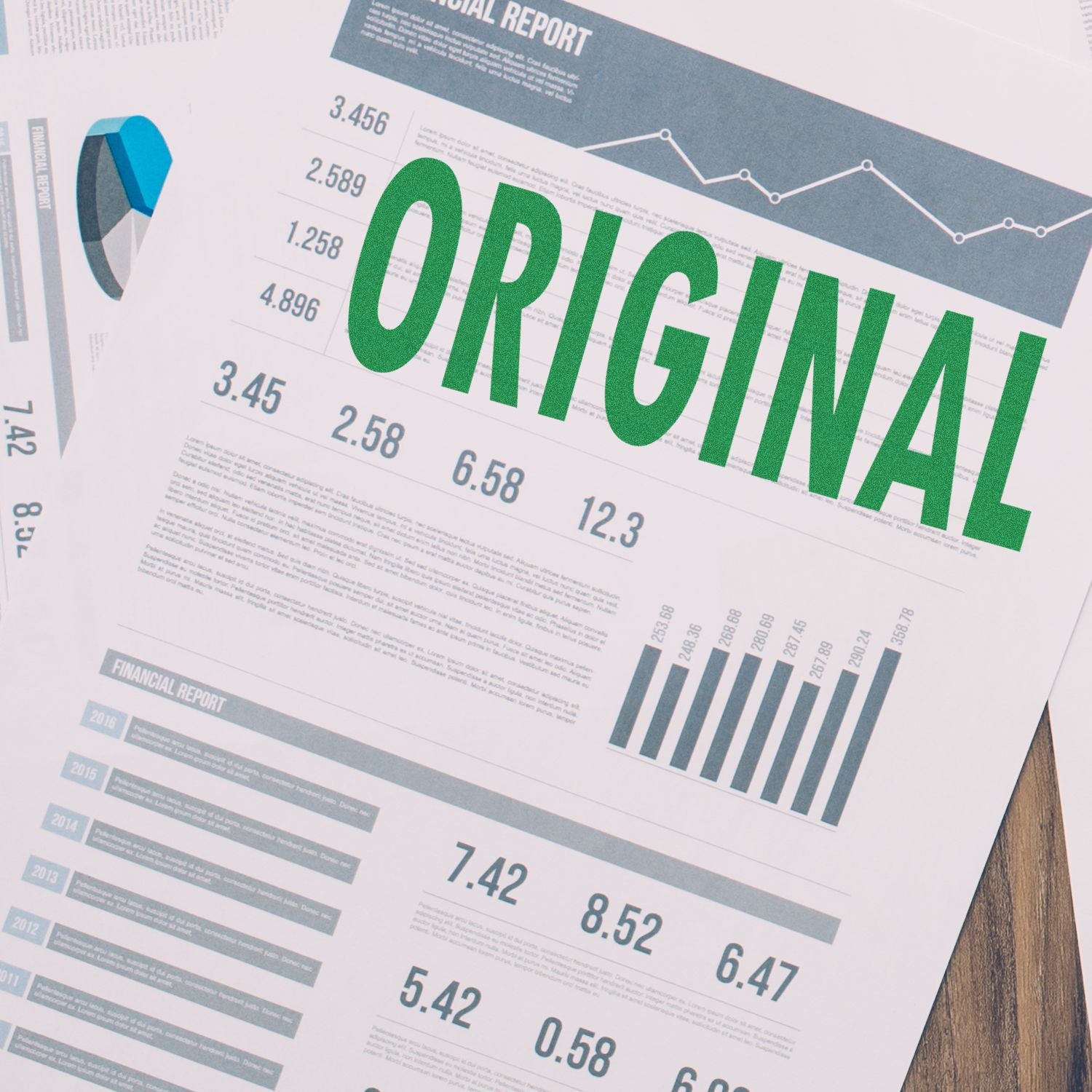 Large Self Inking Original Stamp marking ORIGINAL in green on a financial report with charts and graphs.