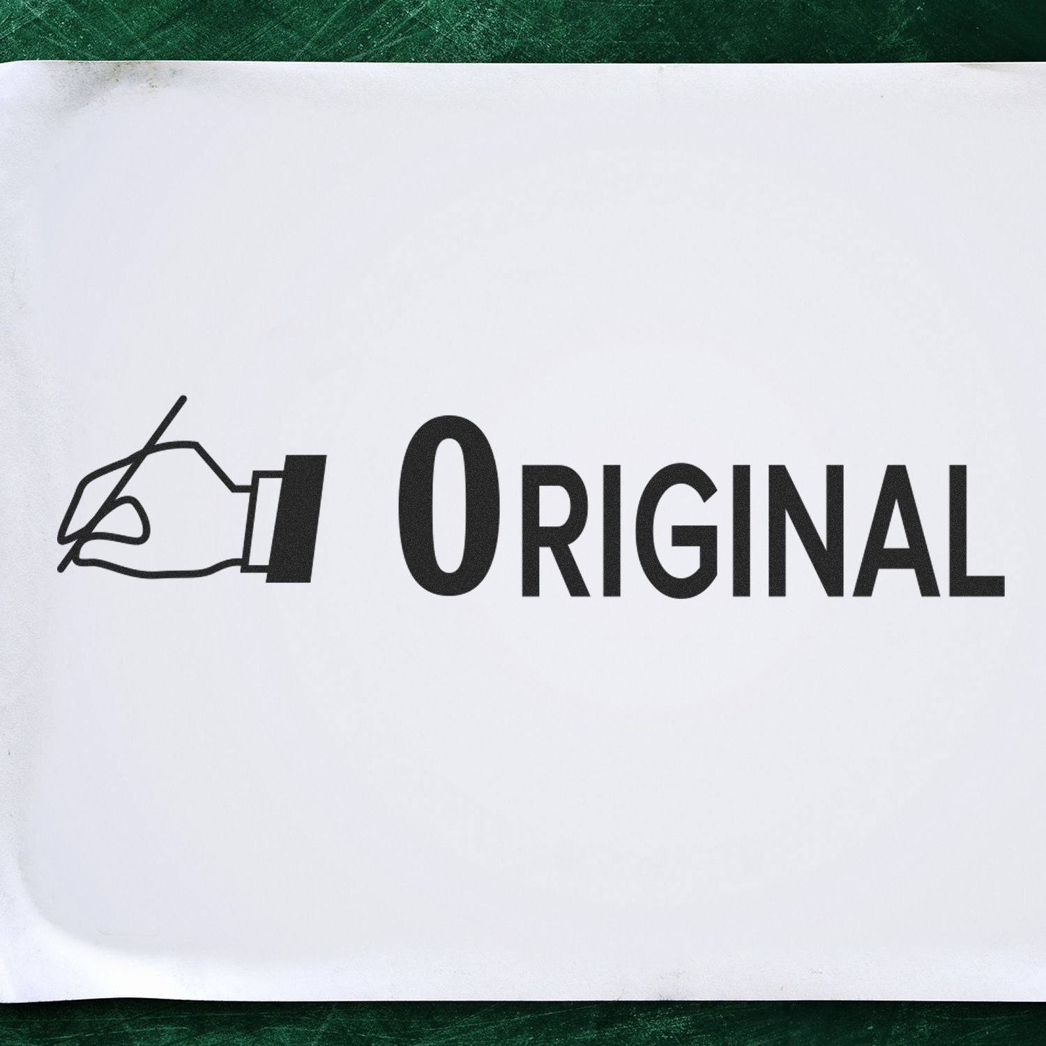 Original with Hand Rubber Stamp image showing a hand holding a stamp next to the word 'Original' on a white background.