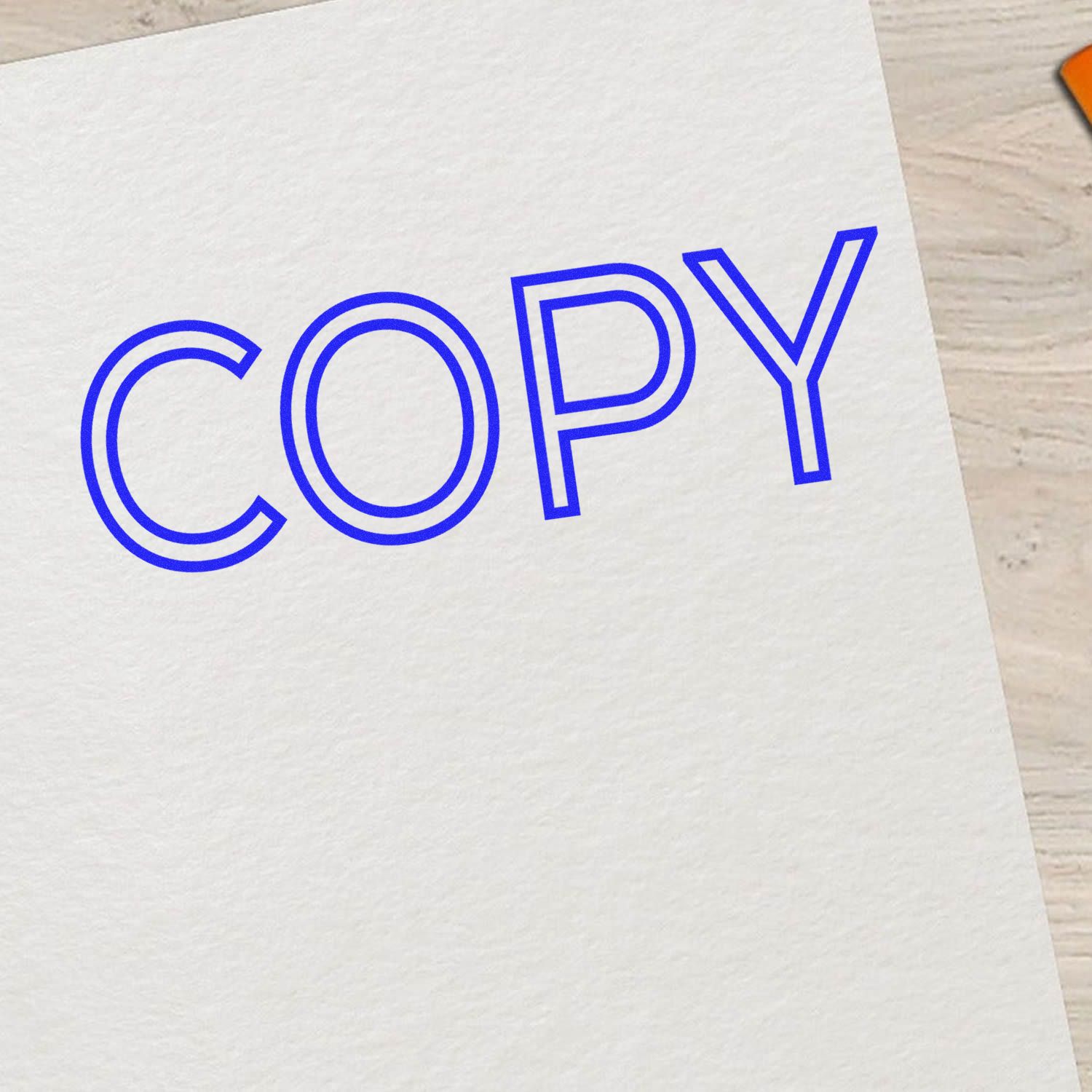 Outline Copy Rubber Stamp imprint in blue ink on white paper, showing the word 'COPY' in bold, outlined letters.