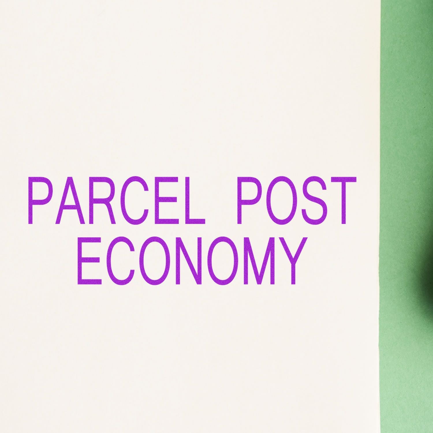 Parcel Post Economy rubber stamp impression in purple ink on white paper, partially shown green background on the right.