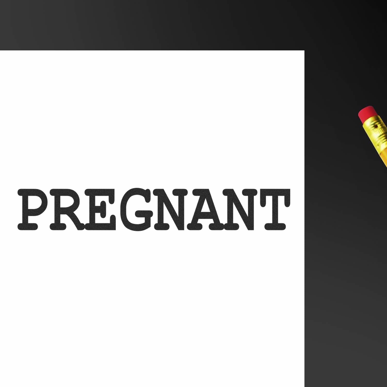 Pregnant Rubber Stamp imprint on white paper with a pencil eraser visible in the corner. The word 'PREGNANT' is clearly stamped in black ink.