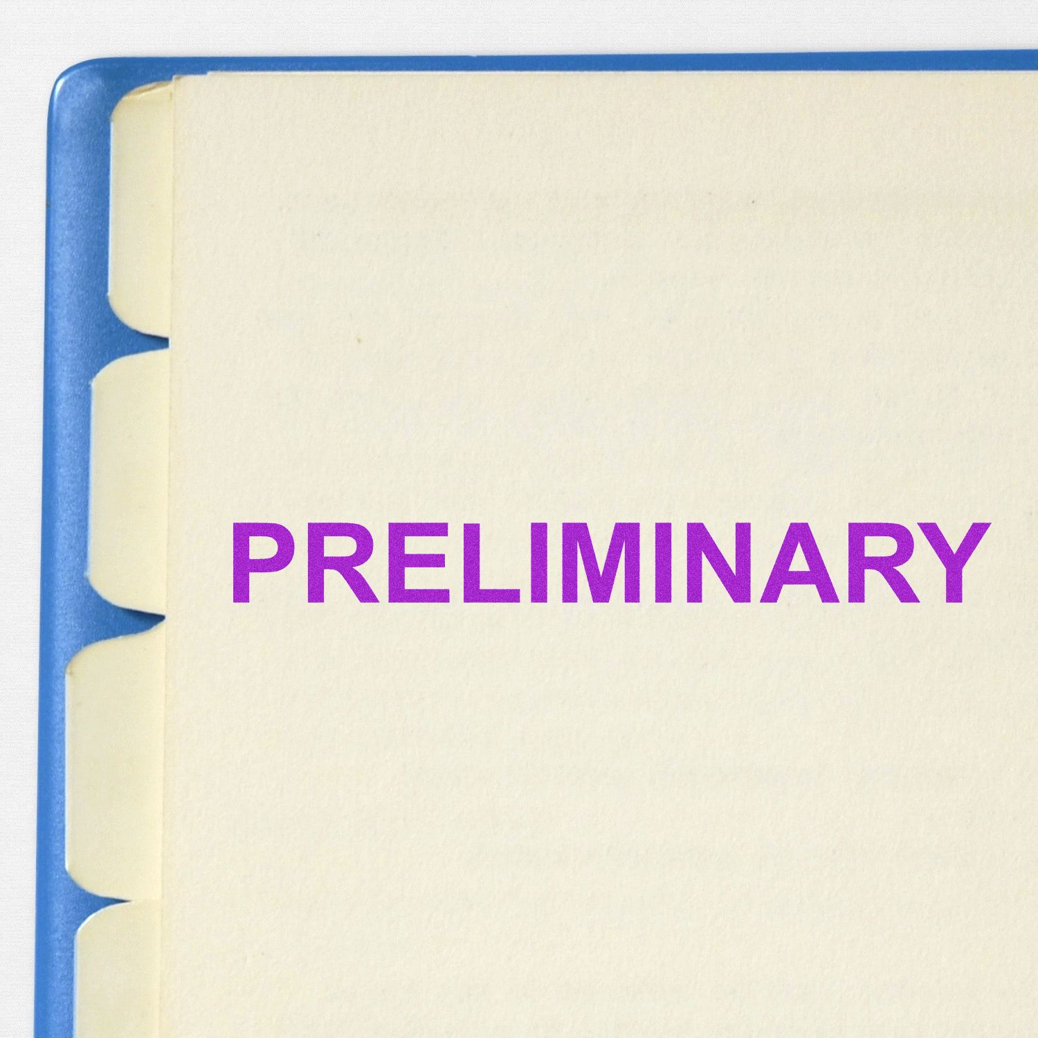 A document with the word PRELIMINARY stamped in purple using a Self Inking Preliminary Stamp, shown on a blue-tabbed folder.