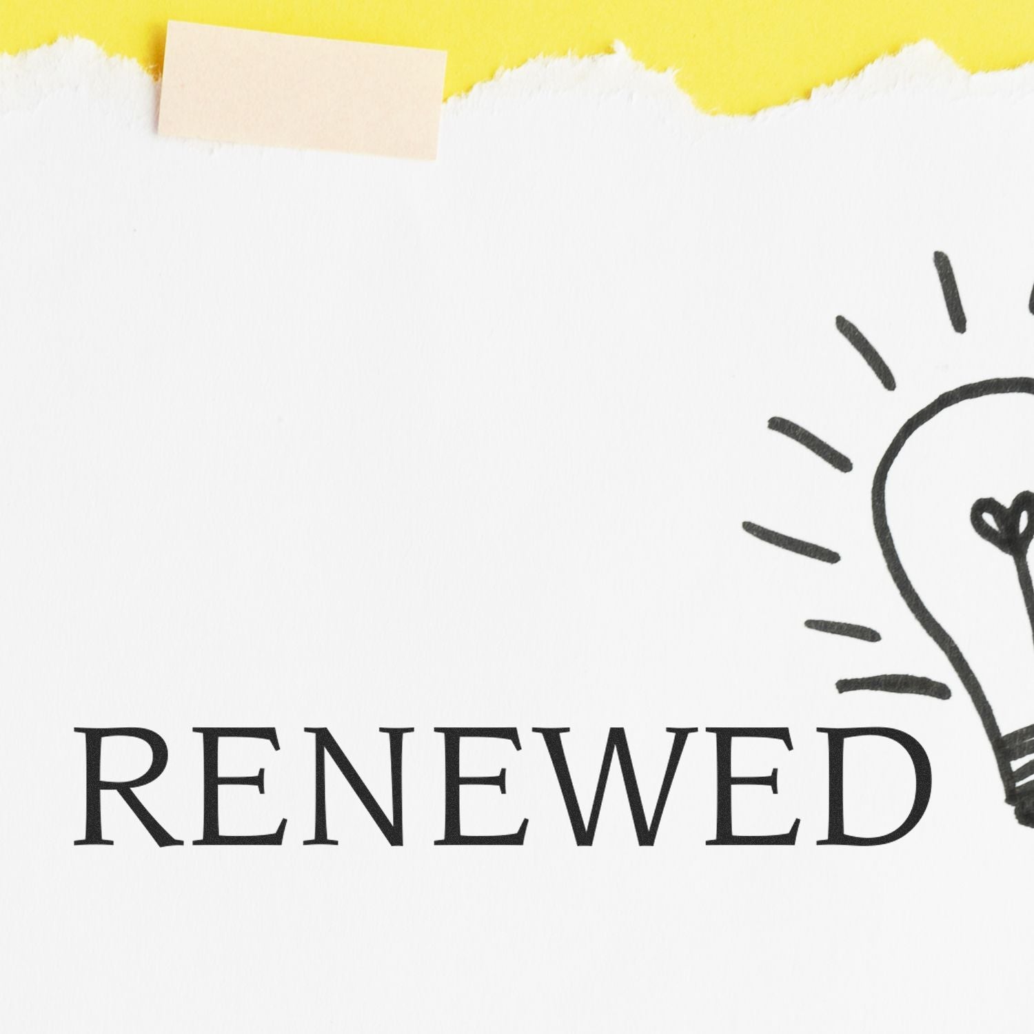 A Large Self Inking Renewed Stamp marks the word RENEWED on white paper with a light bulb doodle, against a yellow background.