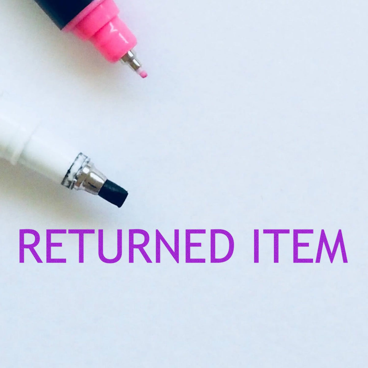 Self Inking Returned Item Stamp In Use