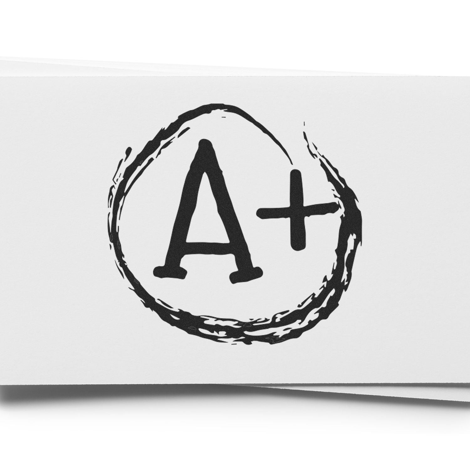 Self Inking Round A+ Stamp imprint on white paper, showing a bold "A+" within a circular brushstroke design.