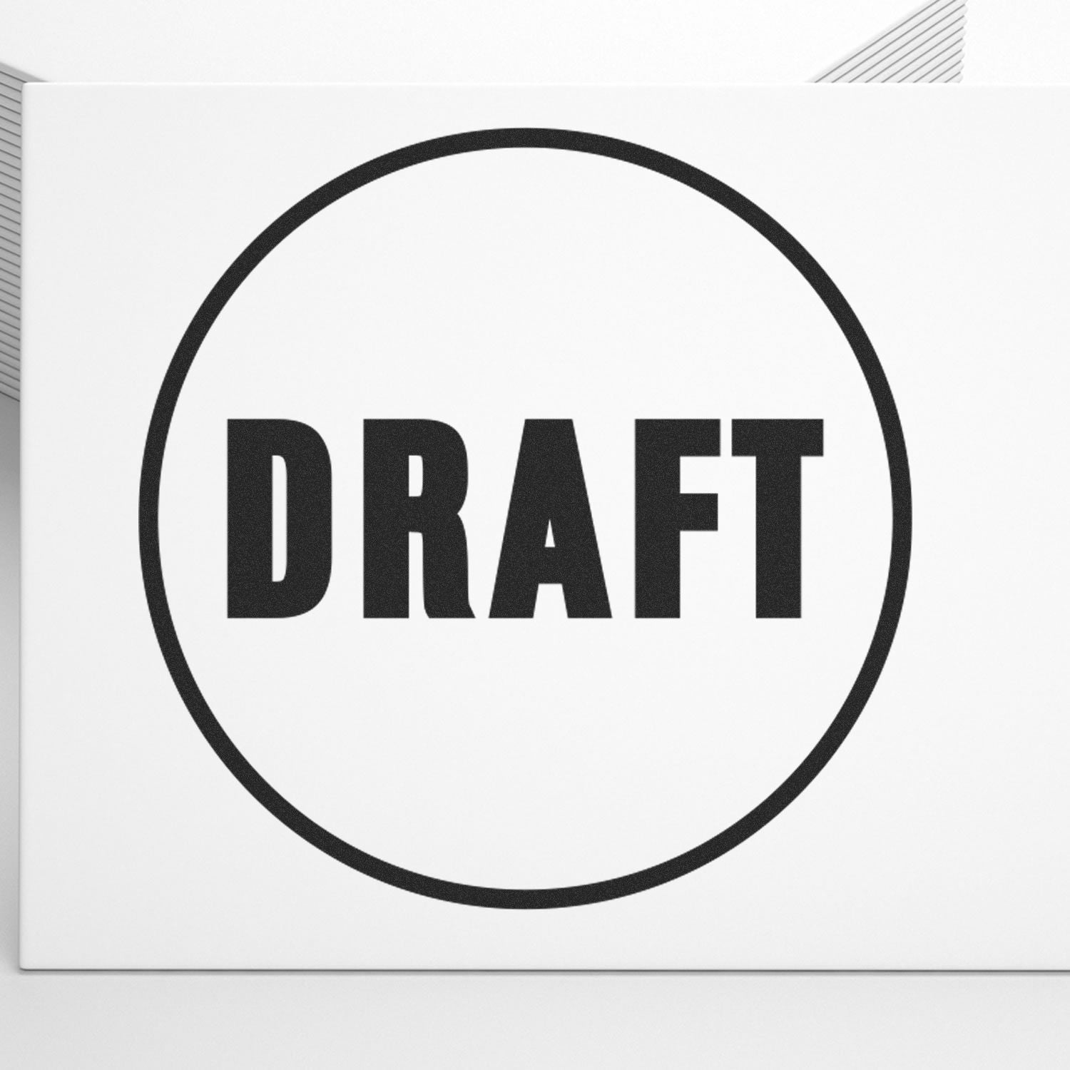 Self Inking Round Draft Stamp imprint on white paper, featuring the word DRAFT in bold black letters within a circular border.