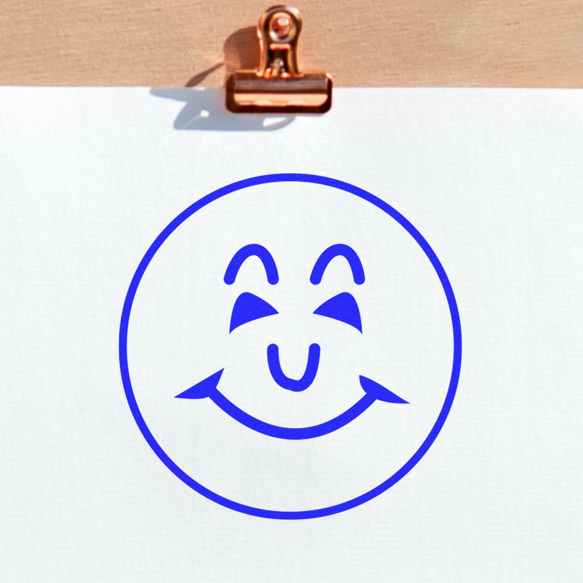 Self-Inking Round Happy Face Stamp In Use Photo