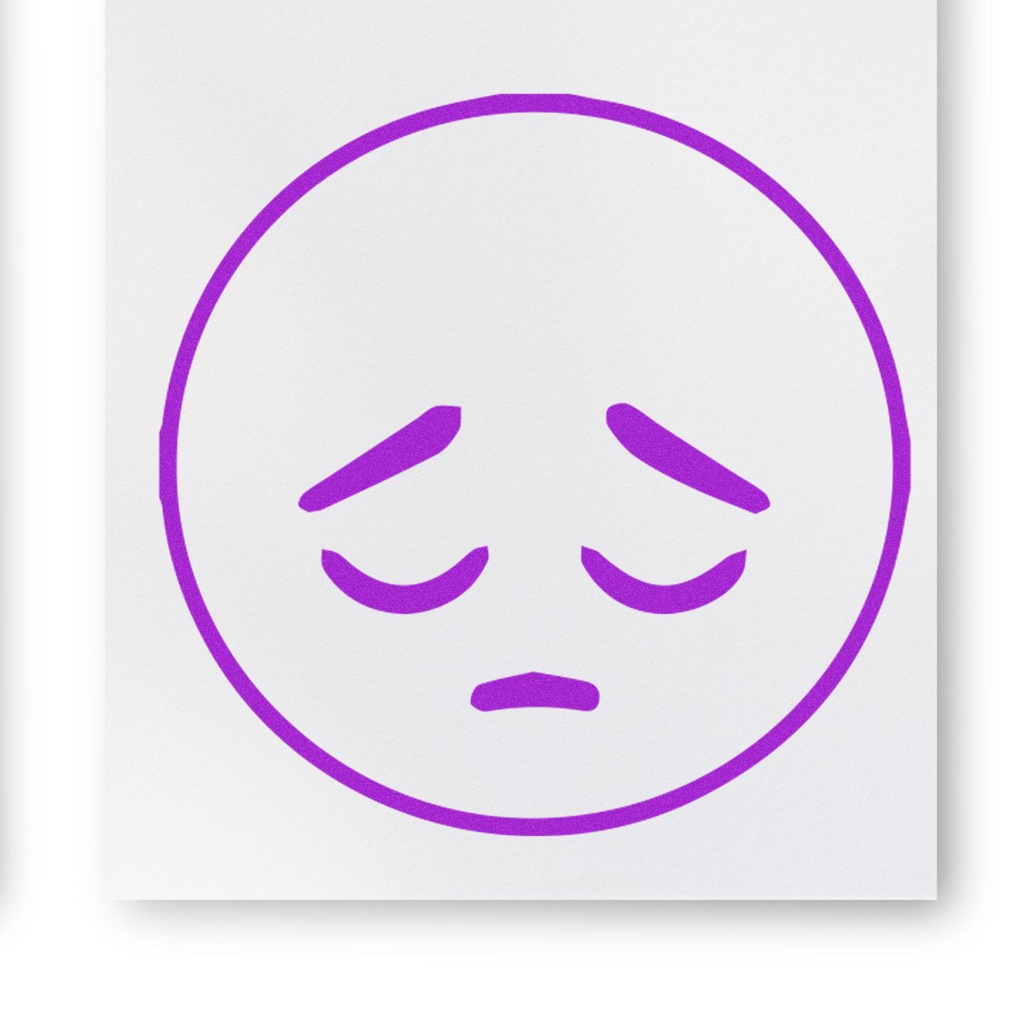 Round Sad Smiley Rubber Stamp in purple ink on white paper, showing a sad face with downturned eyes and mouth.