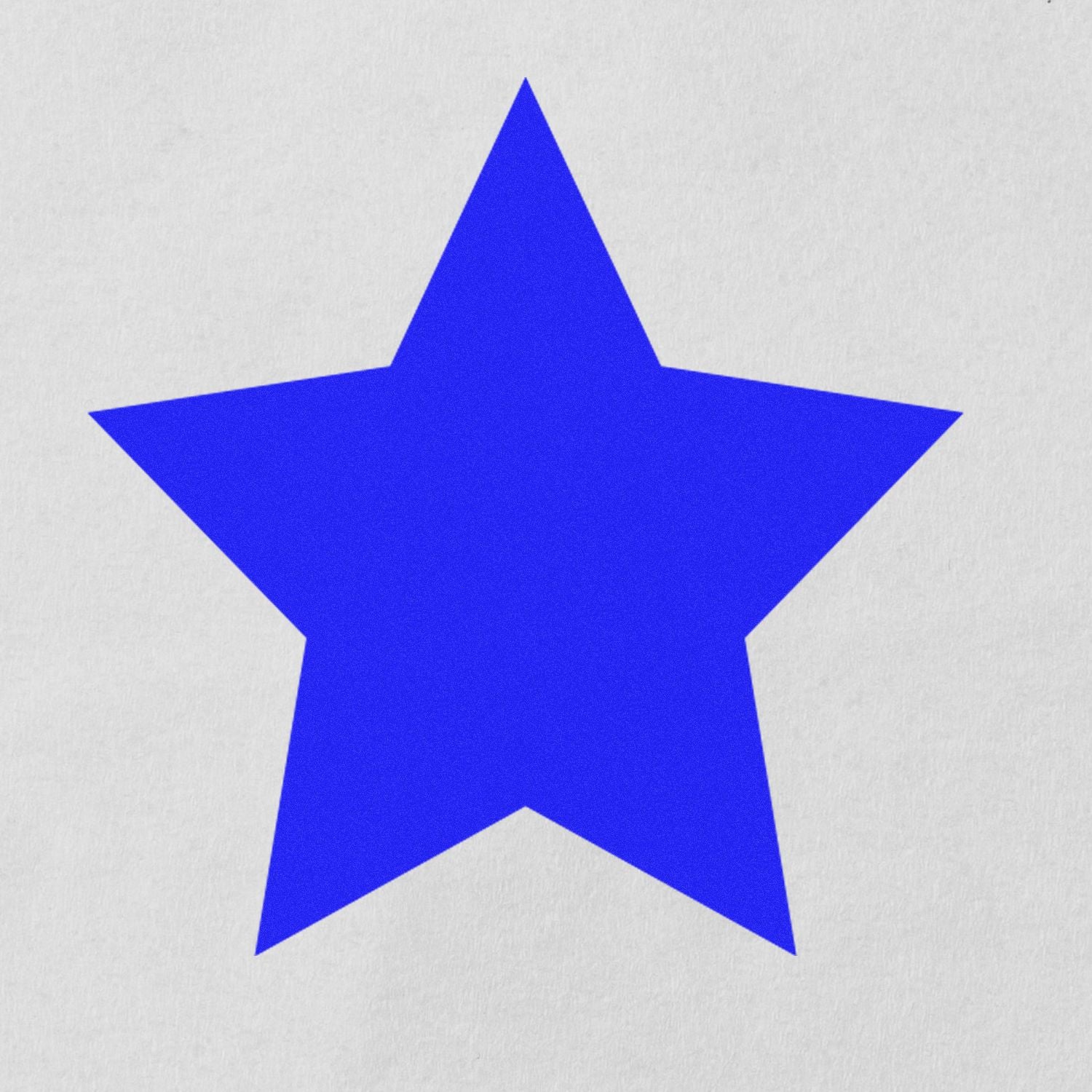 Round Solid Star Rubber Stamp in blue ink on white paper, showcasing a clean and crisp star imprint.