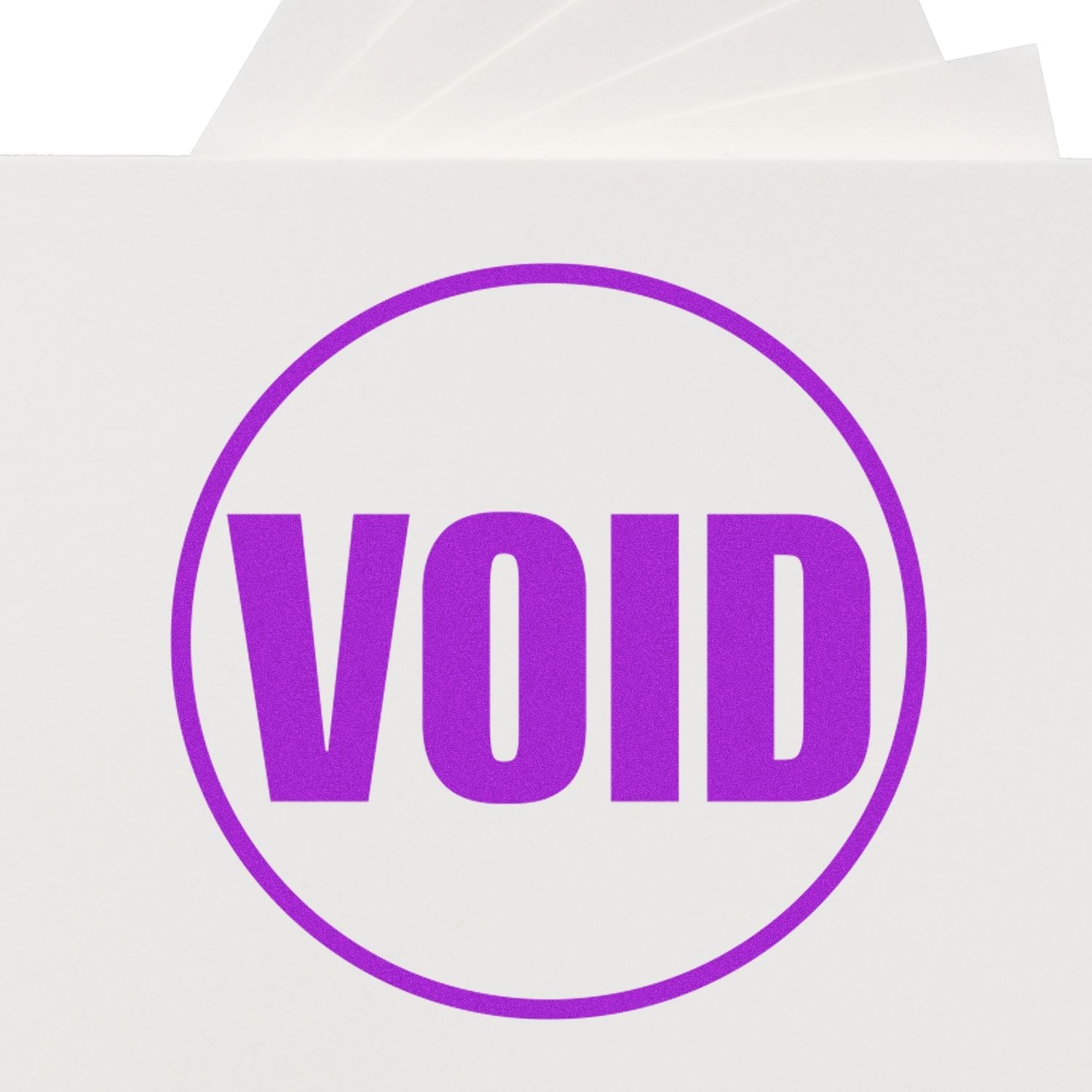 Self Inking Round Void Stamp imprinting a bold, purple VOID on white paper, highlighting its clear and precise marking capability.