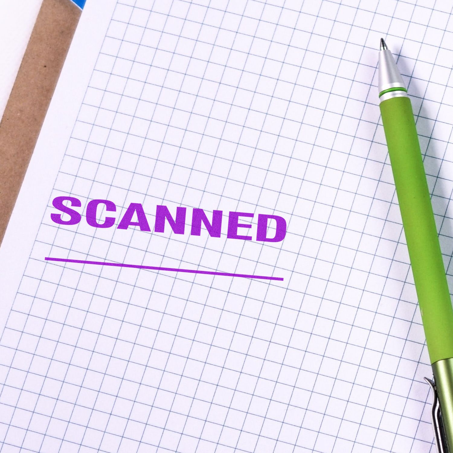 A green pen on graph paper stamped with "Scanned with Line Rubber Stamp" in purple ink.