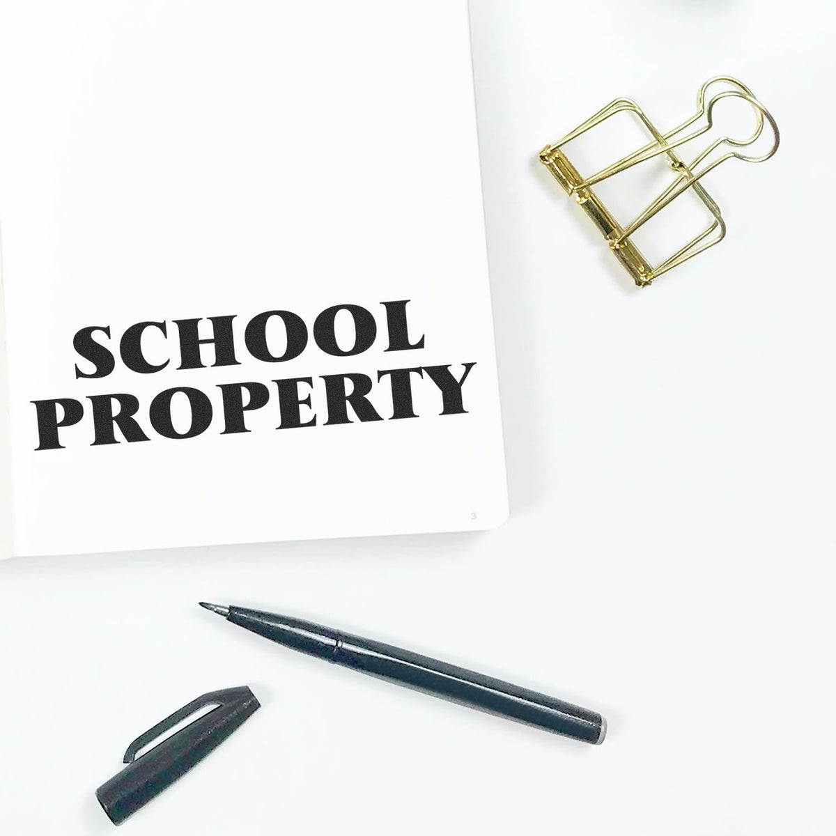 Large Self-Inking School Property Stamp Lifestyle Photo