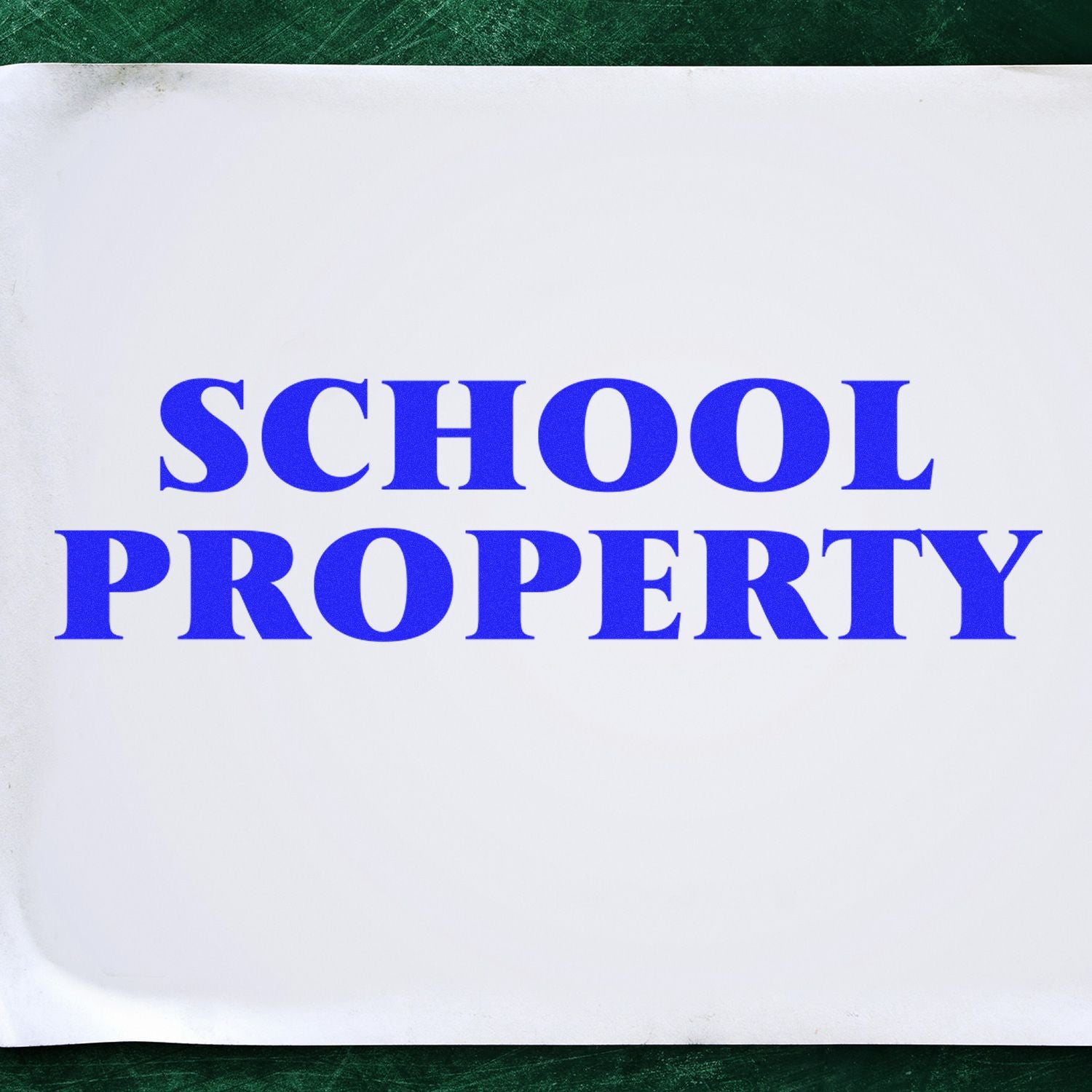 Large Pre-Inked School Property Stamp imprint on white paper with bold blue text 'SCHOOL PROPERTY' against a green background.