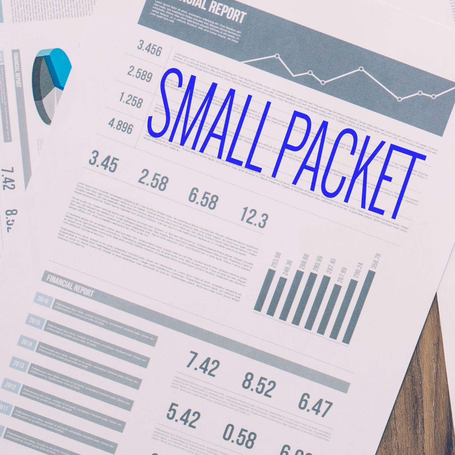 Large Small Packet Rubber Stamp used on financial report documents with graphs and charts.